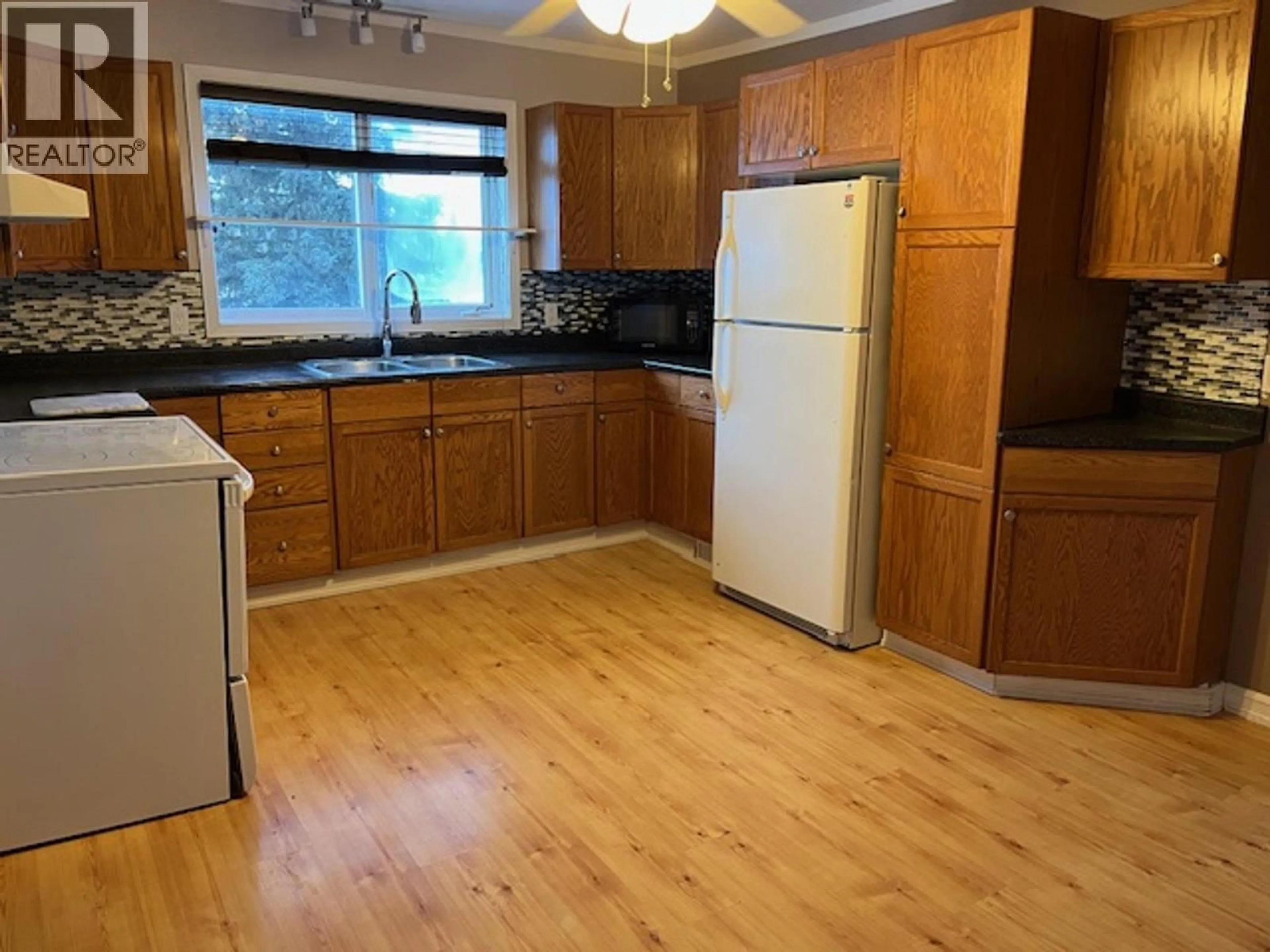 Standard kitchen, wood/laminate floor for 13095 LAKESHORE DRIVE, Fort St. John British Columbia V1J1H0