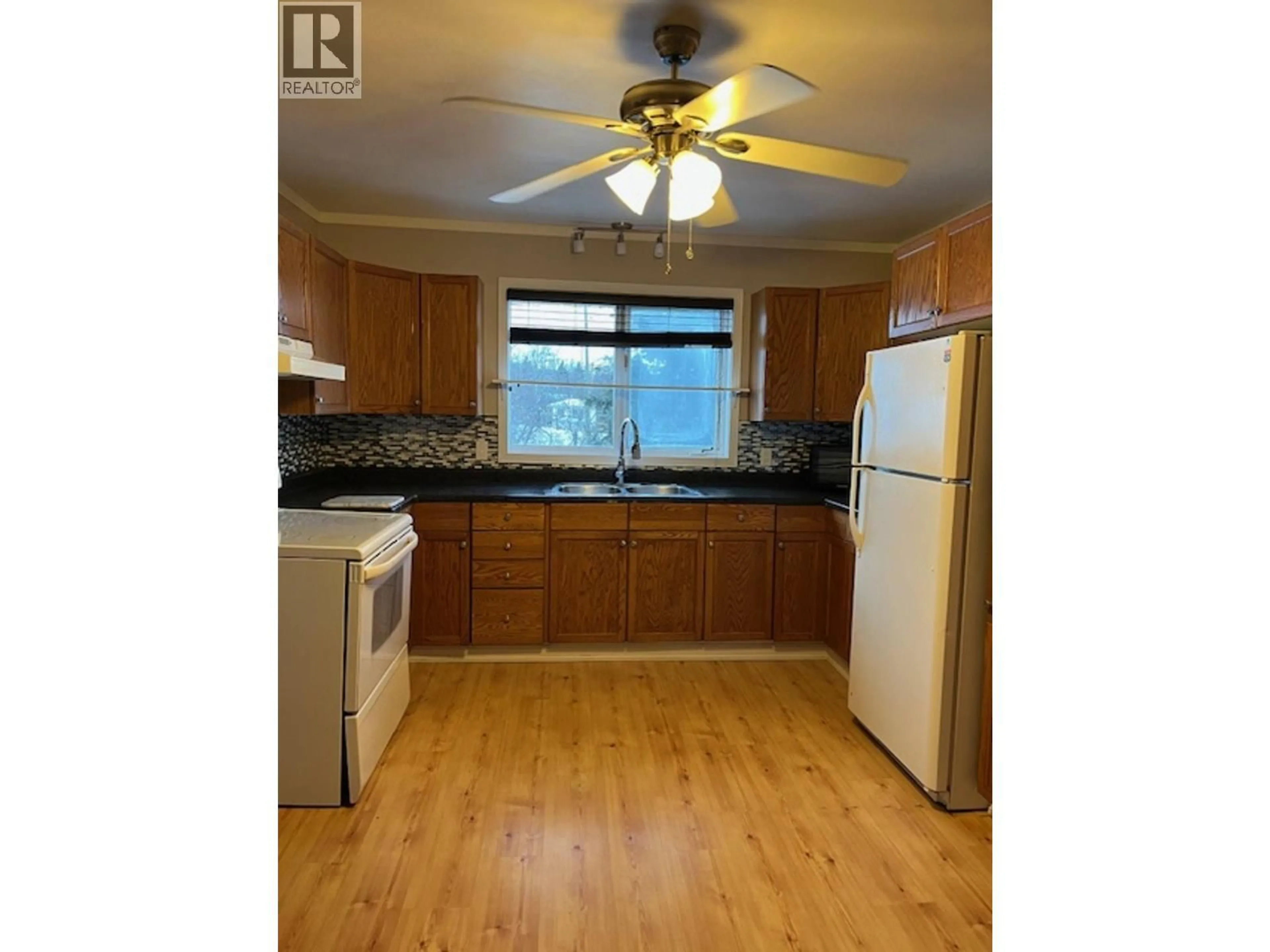 Standard kitchen, wood/laminate floor for 13095 LAKESHORE DRIVE, Fort St. John British Columbia V1J1H0