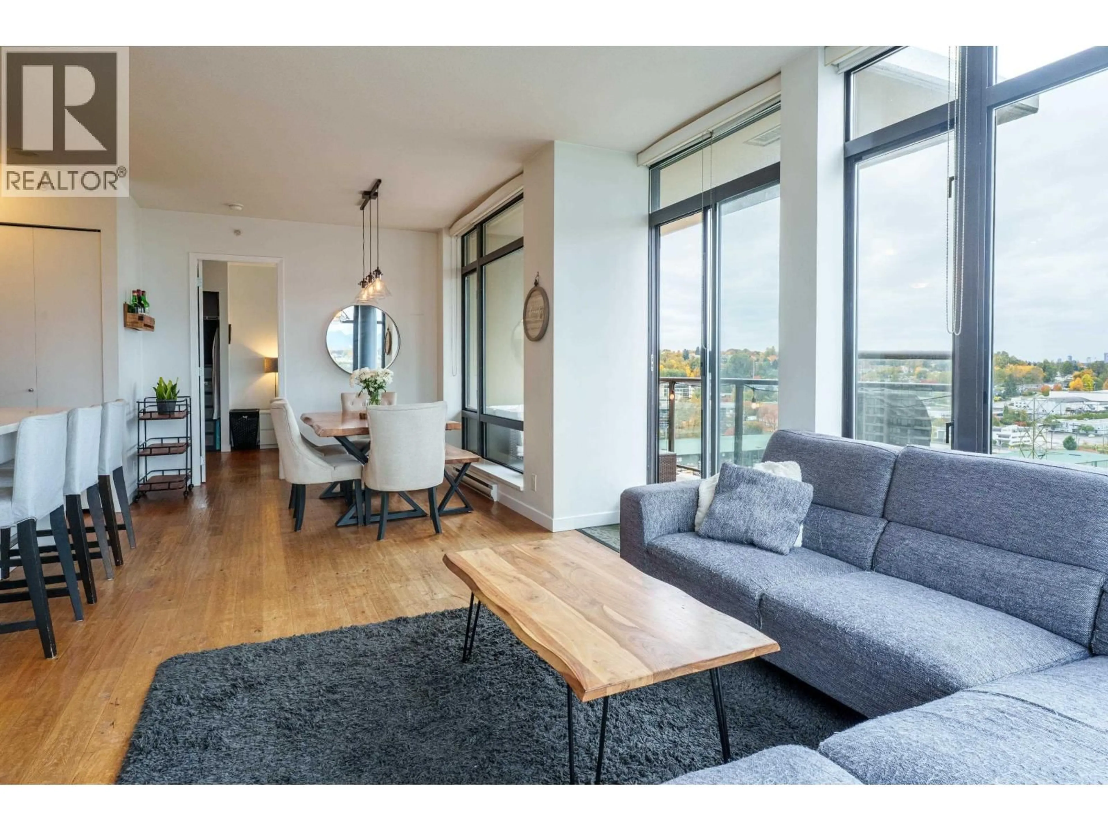 Living room with furniture, wood/laminate floor for 1504 - 2355 MADISON AVENUE, Burnaby British Columbia V5C0B3