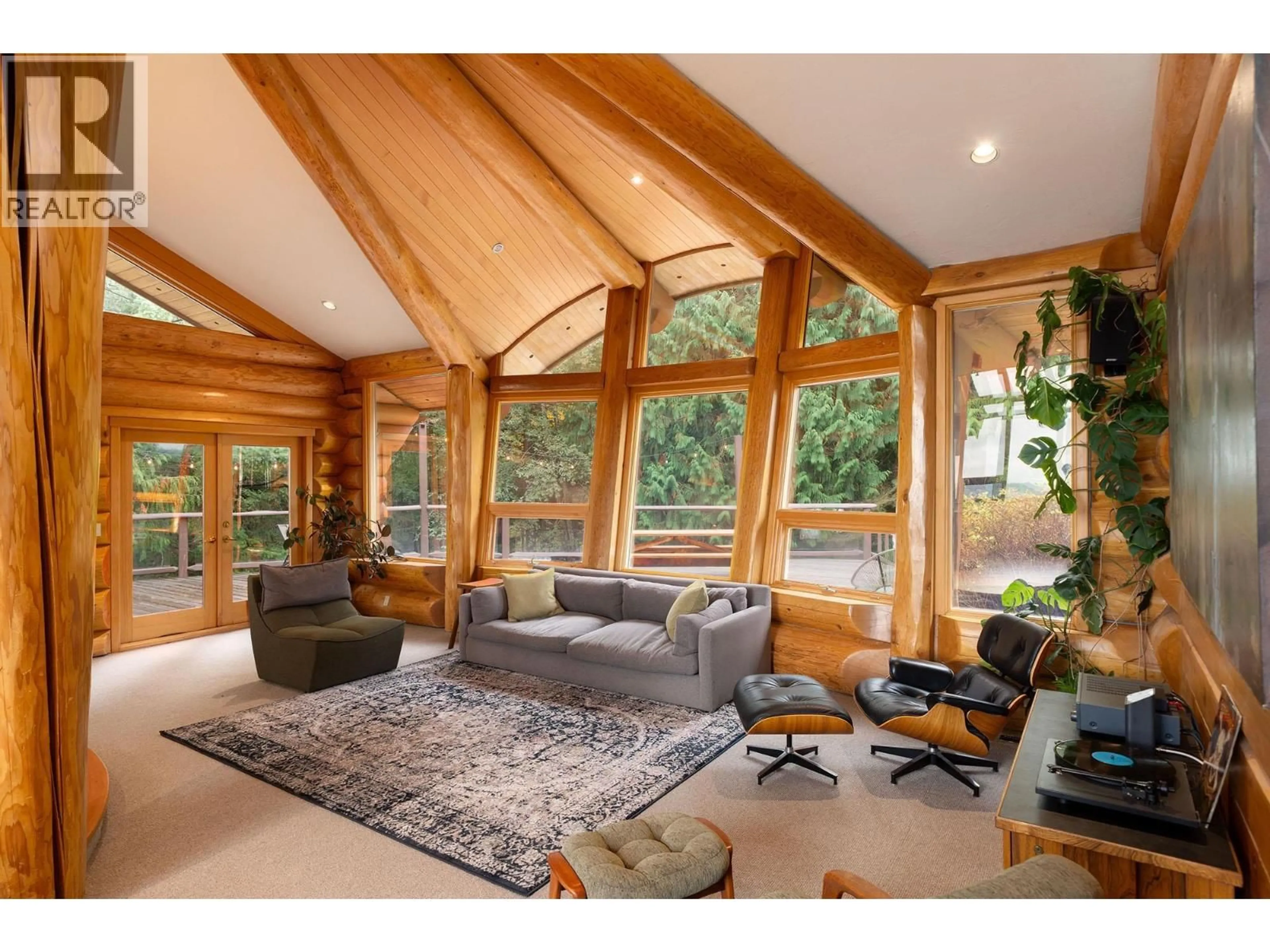 Living room with furniture, wood/laminate floor for 675 CATES LANE, Bowen Island British Columbia V0N1G2