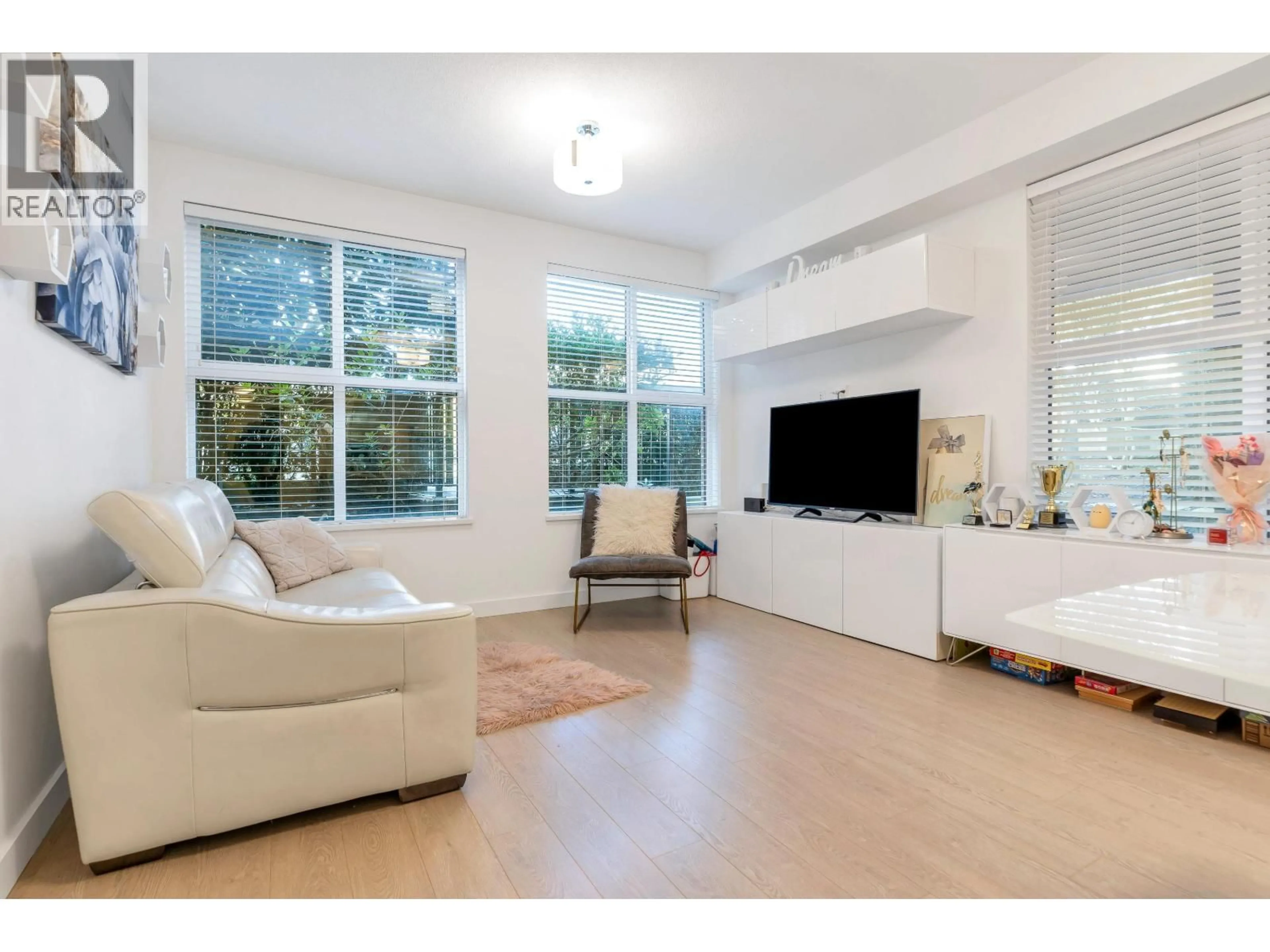 Living room with furniture, unknown for 107 - 7988 YUKON STREET, Vancouver British Columbia V5X2Y7