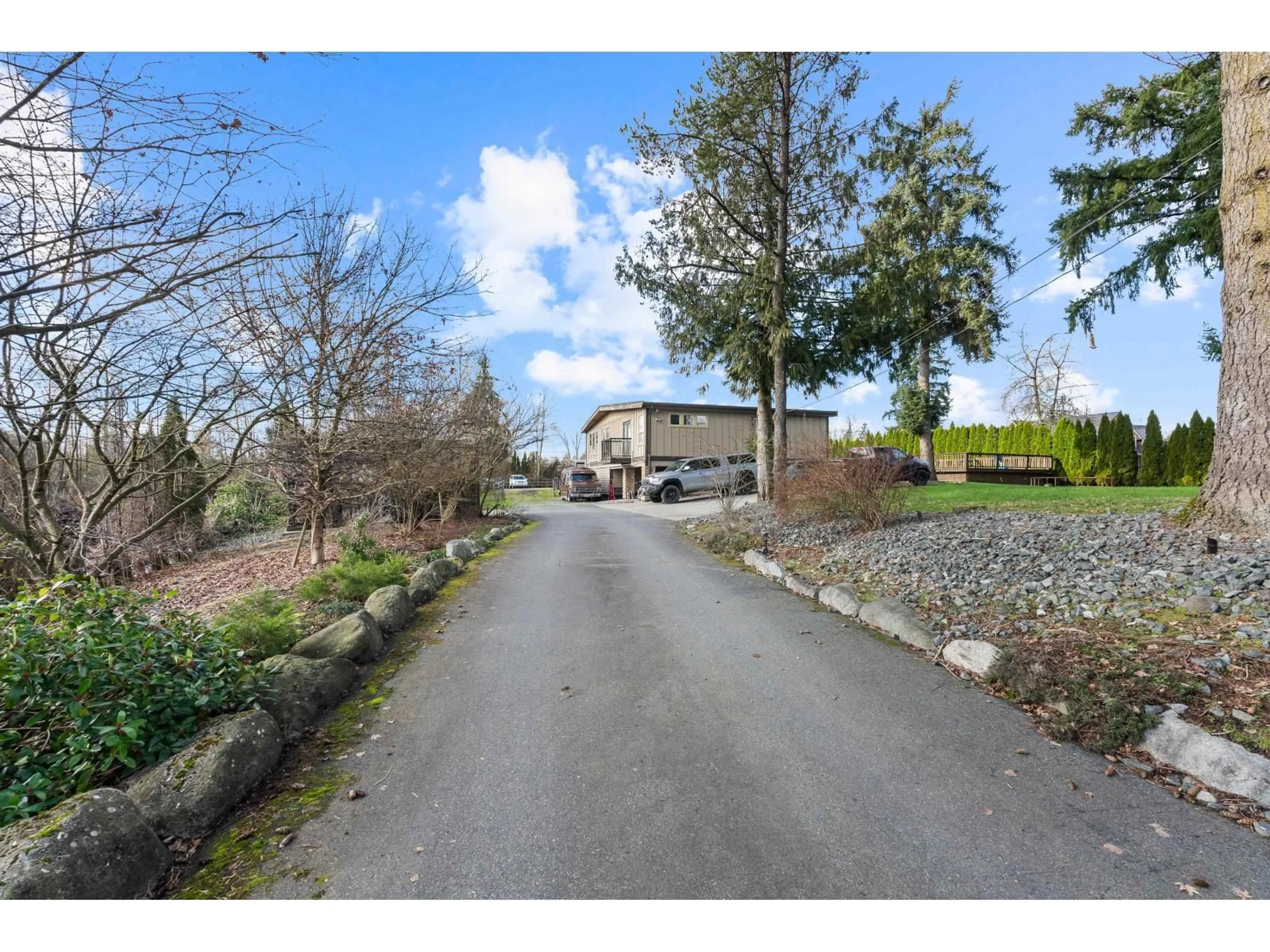 A pic from outside/outdoor area/front of a property/back of a property/a pic from drone, street for 9729 216 STREET, Langley British Columbia V1M3J1