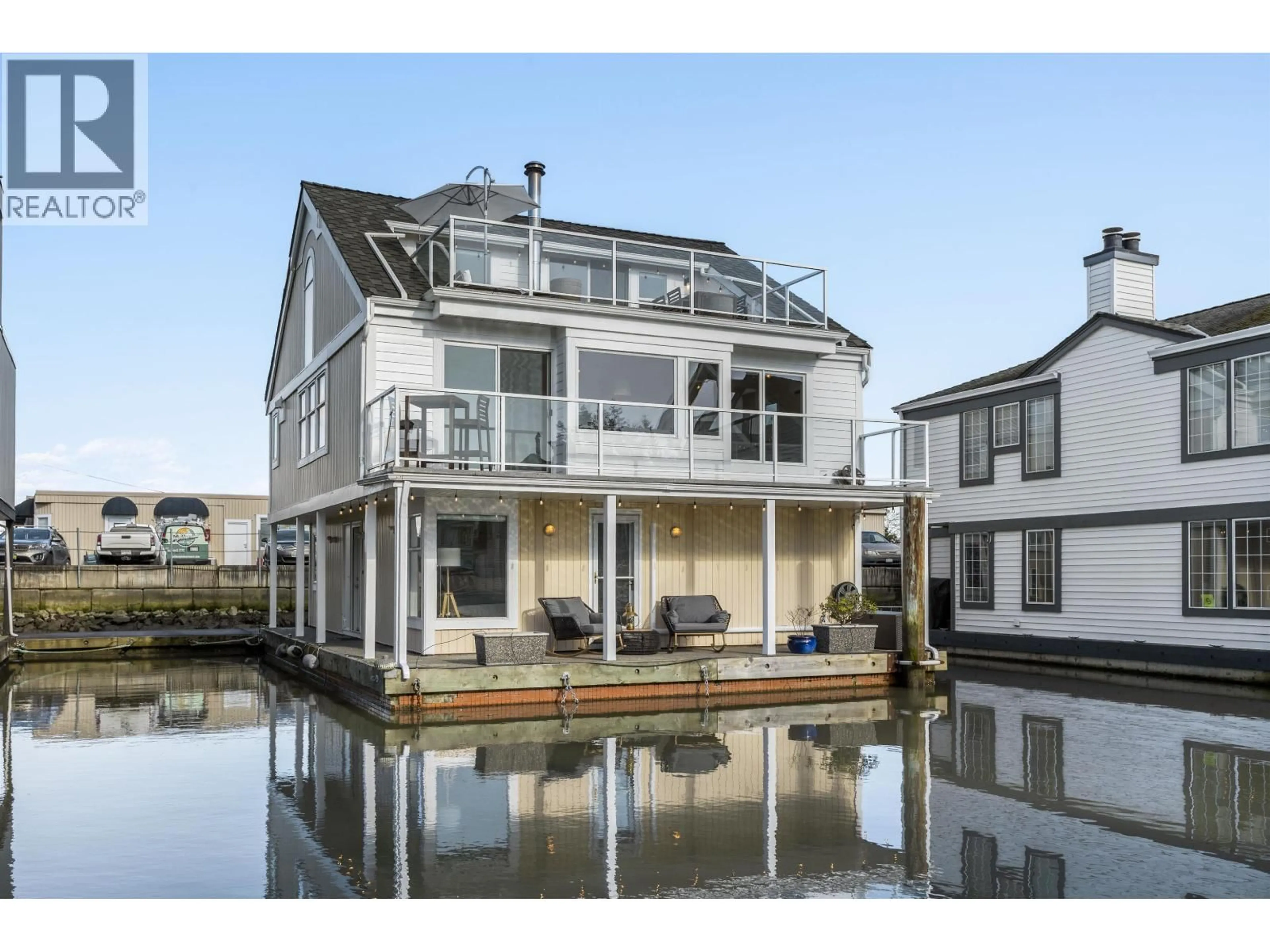 Home with vinyl exterior material, water/lake/river/ocean view for 10 - 3459 RIVER ROAD, Ladner British Columbia V4K4Y6