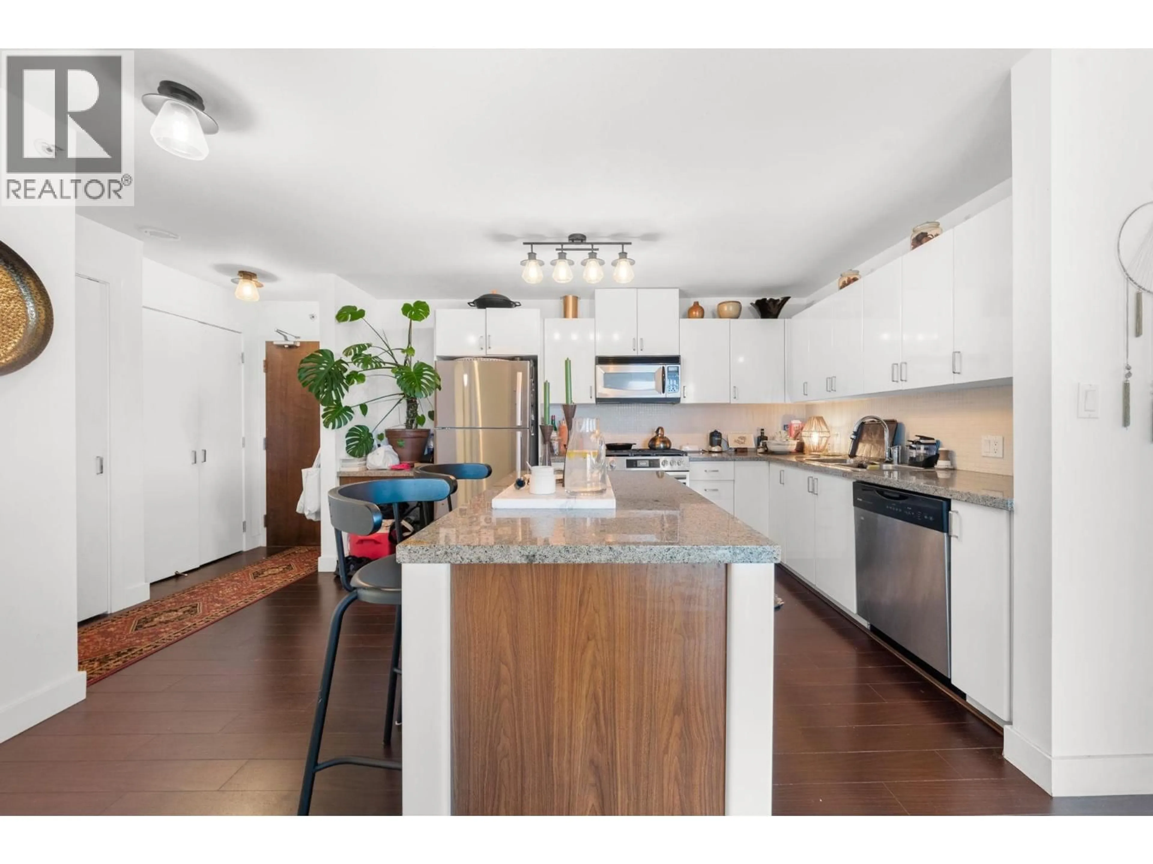 Open concept kitchen, unknown for 704 - 155 1ST STREET, North Vancouver British Columbia V7M3N8