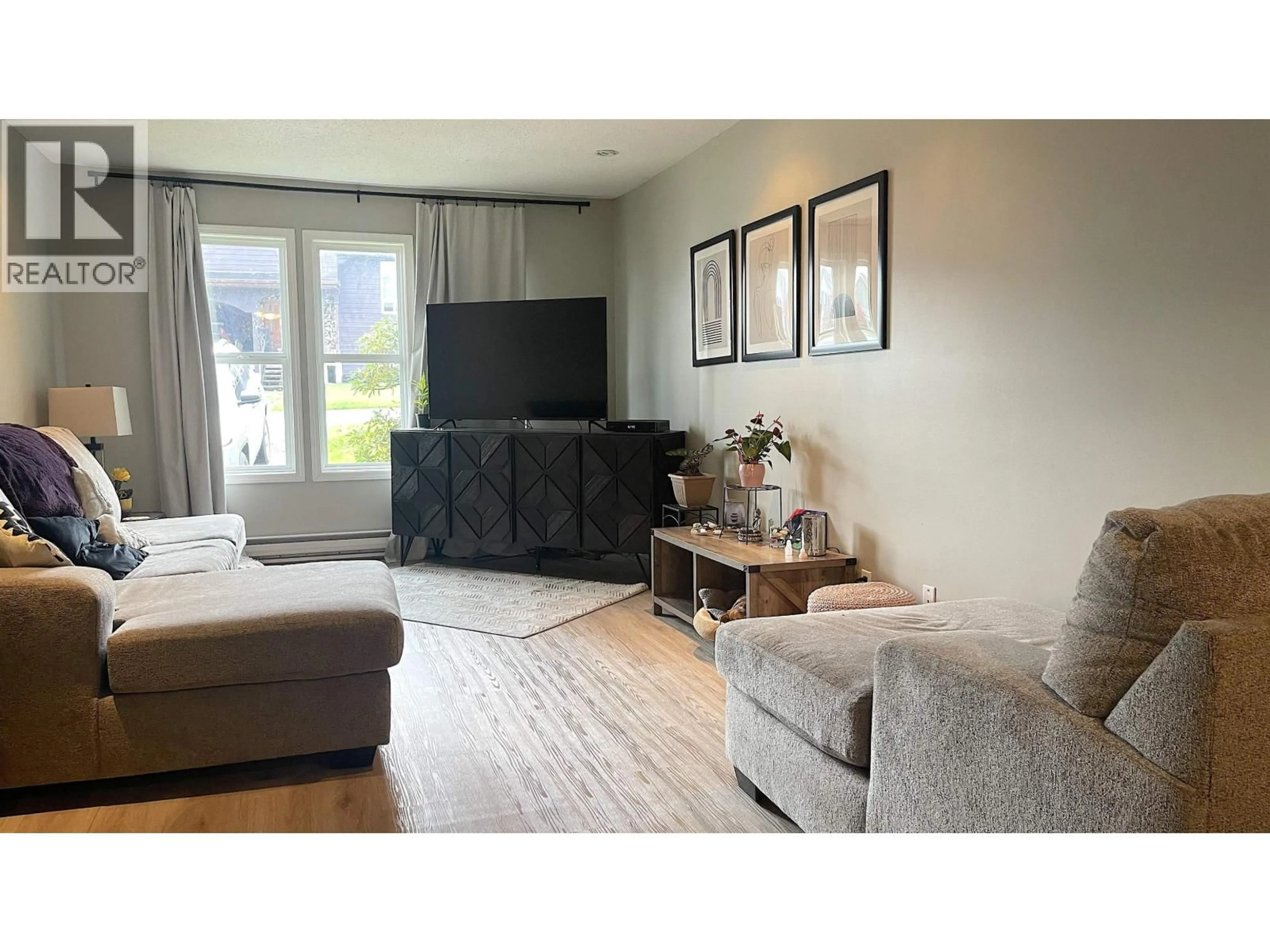 Living room with furniture, wood/laminate floor for 116 GULL CRESCENT, Prince Rupert British Columbia V8J4G5