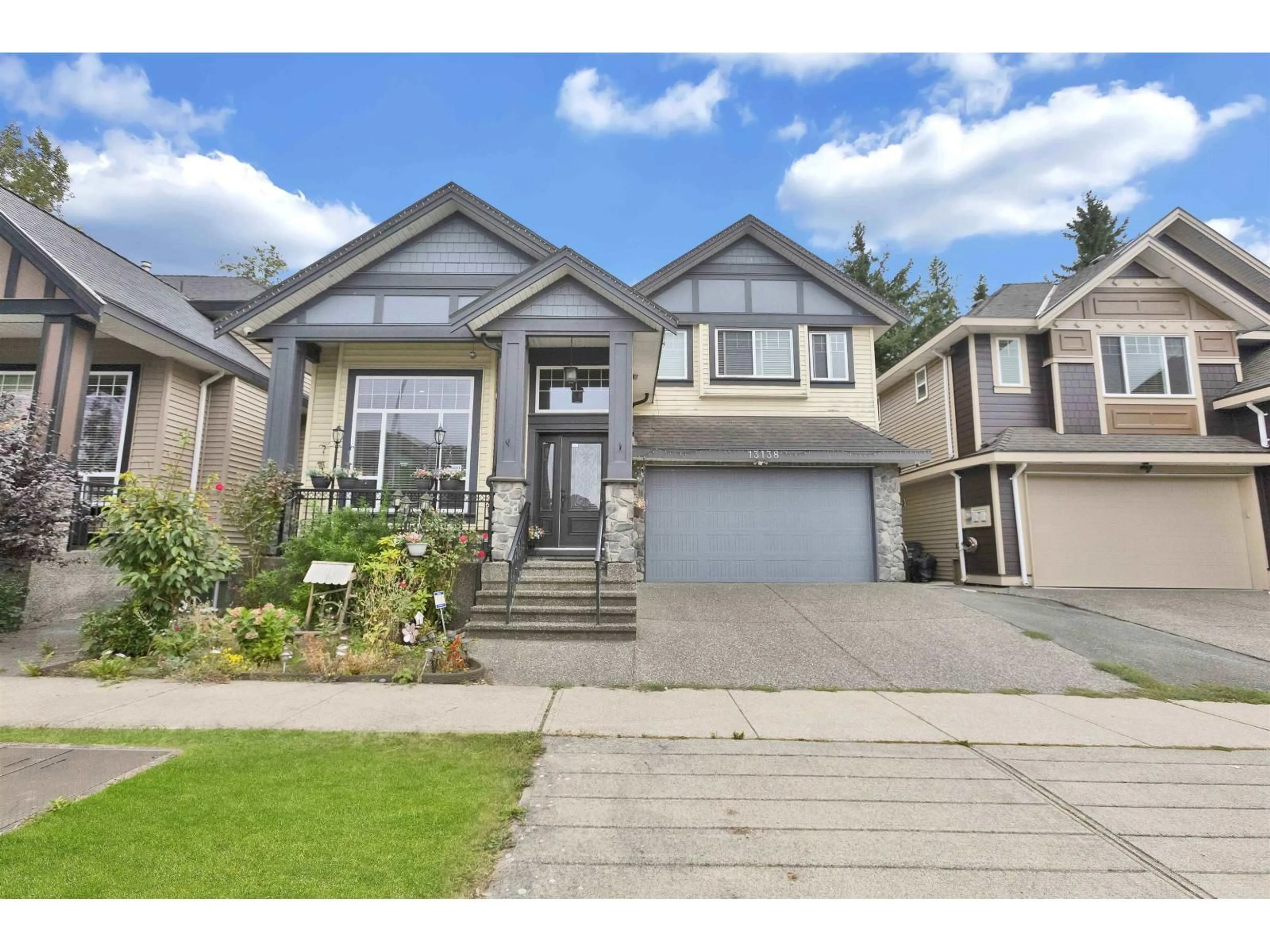 Home with vinyl exterior material, street for 13138 58A AVENUE, Surrey British Columbia V3X0E4