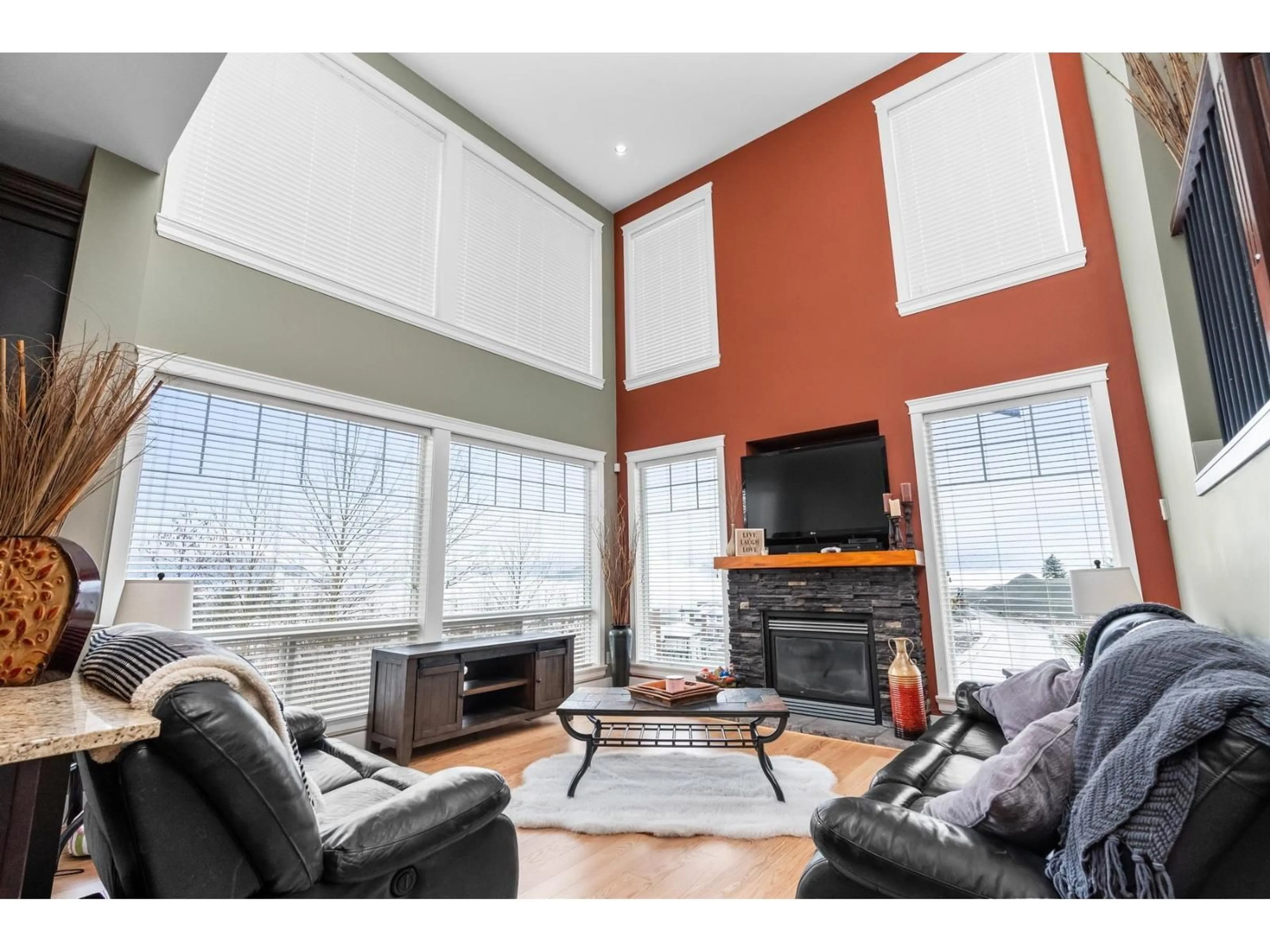 Living room with furniture, wood/laminate floor for 5157 DHALIWAL PLACE, Chilliwack British Columbia V2R0J4