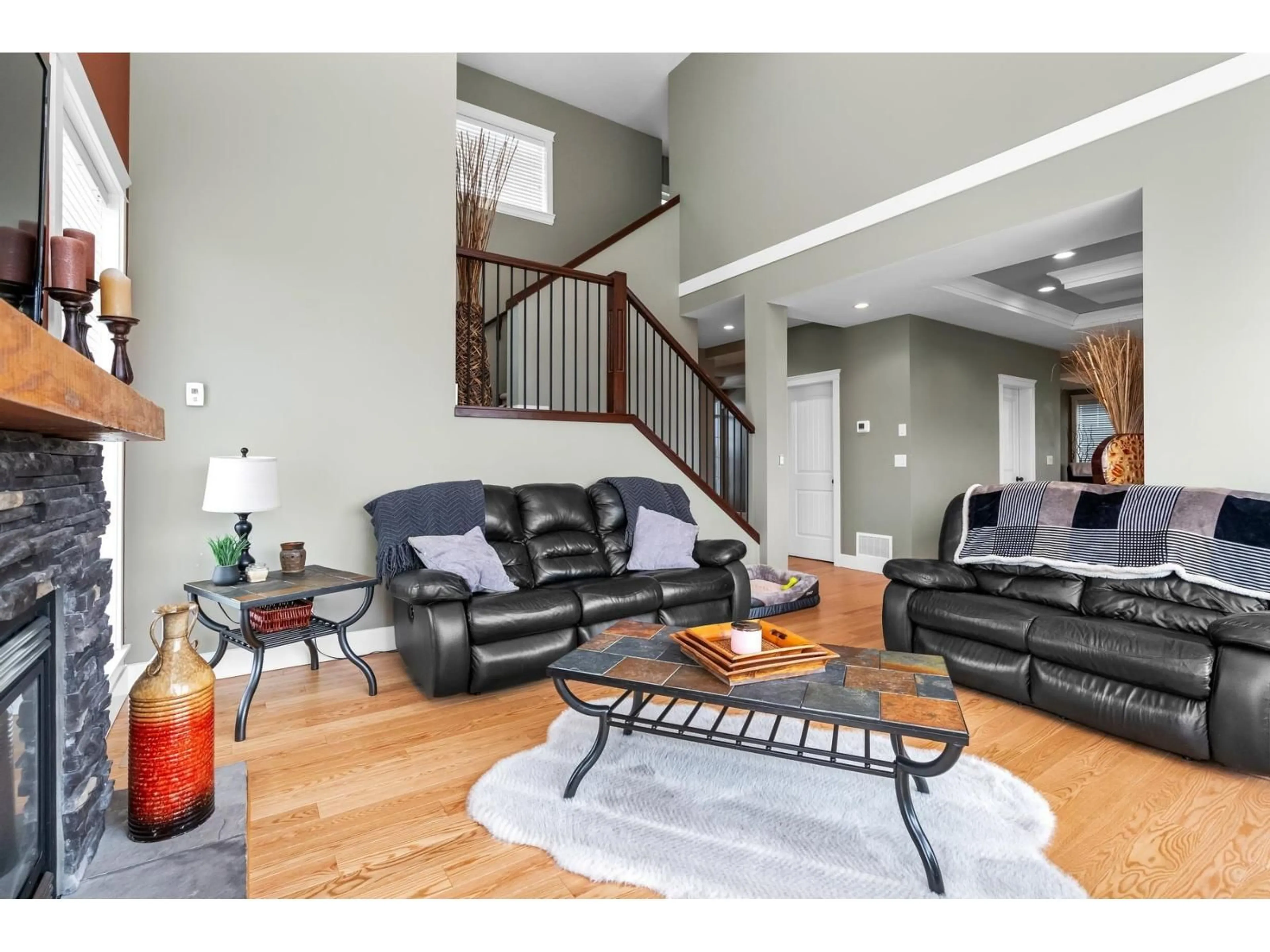 Living room with furniture, wood/laminate floor for 5157 DHALIWAL PLACE, Chilliwack British Columbia V2R0J4