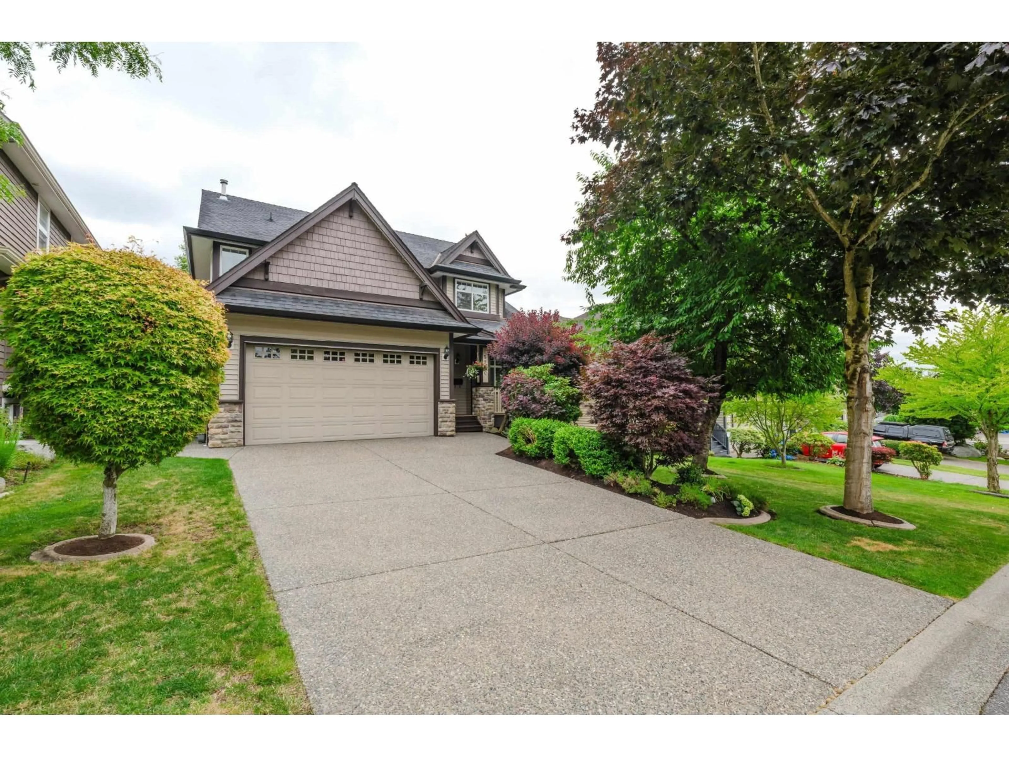 Home with vinyl exterior material, street for 5770 167A STREET, Surrey British Columbia V3S9T2