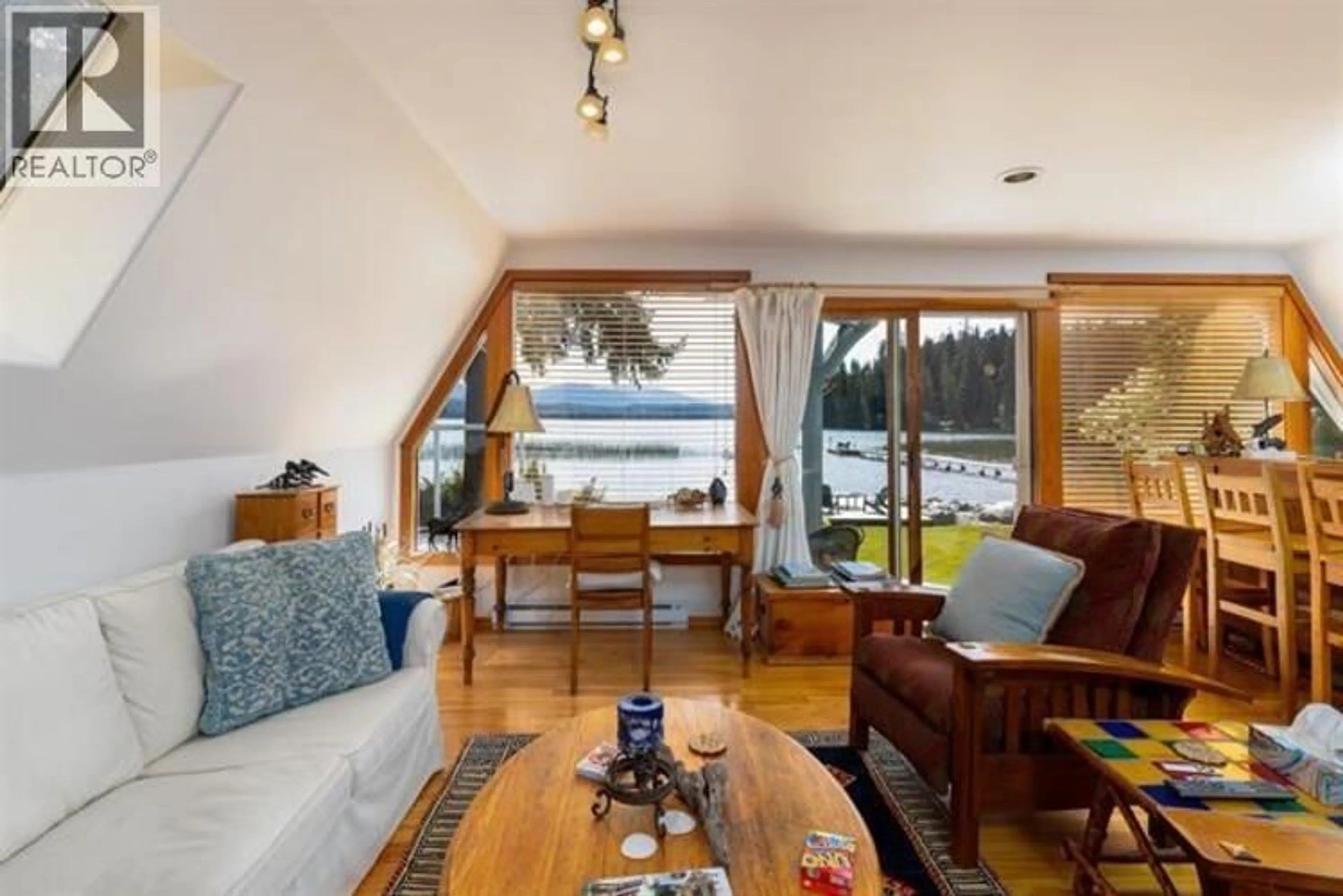 Living room with furniture, wood/laminate floor for 4685 LAKESIDE DRIVE, Terrace British Columbia V8G1T1