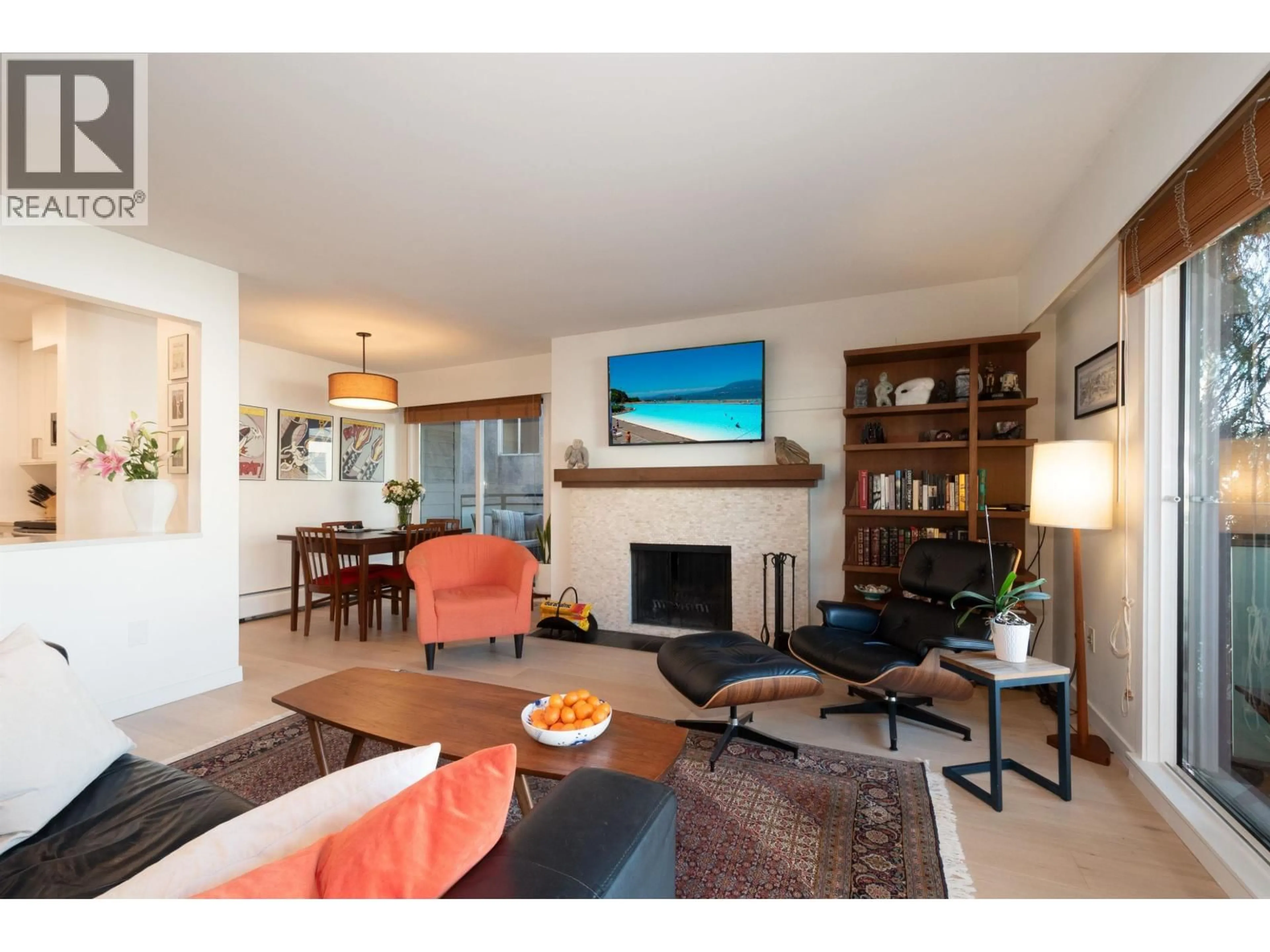 Living room with furniture, wood/laminate floor for 212 - 2255 YORK AVENUE, Vancouver British Columbia V6K1C5