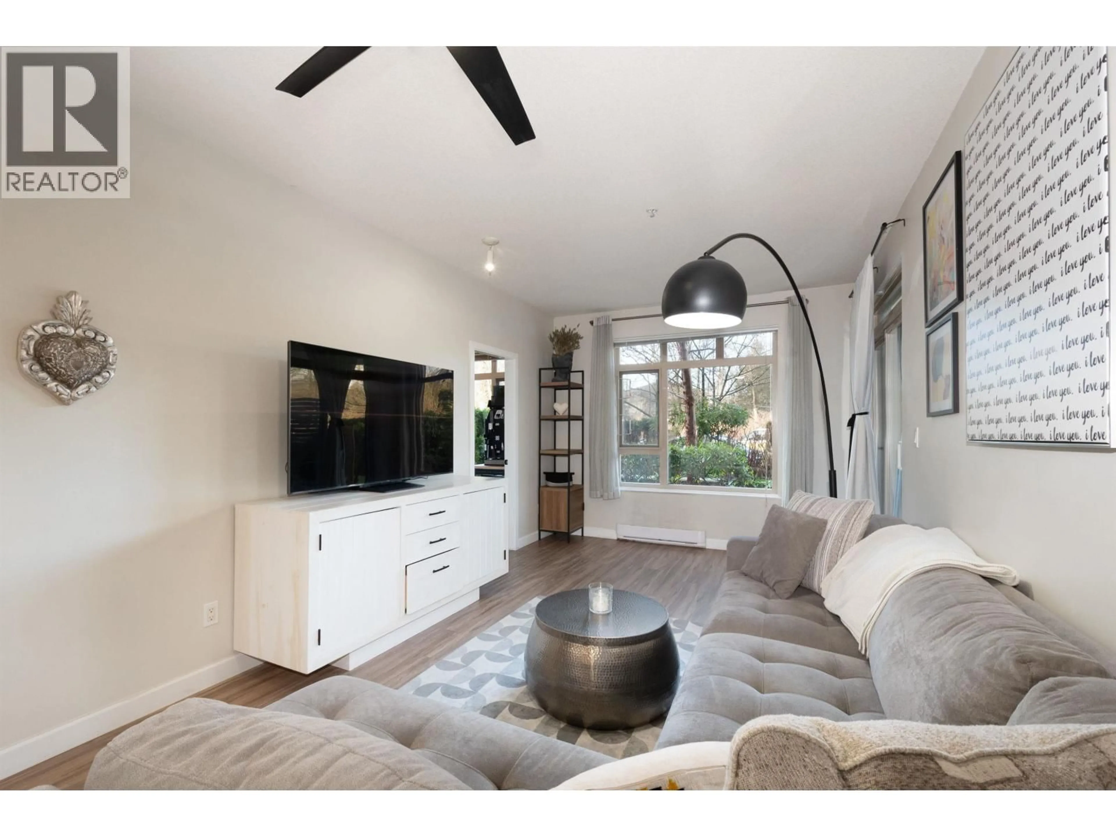 Living room with furniture, unknown for 121 - 100 CAPILANO ROAD, Port Moody British Columbia V3H5M9