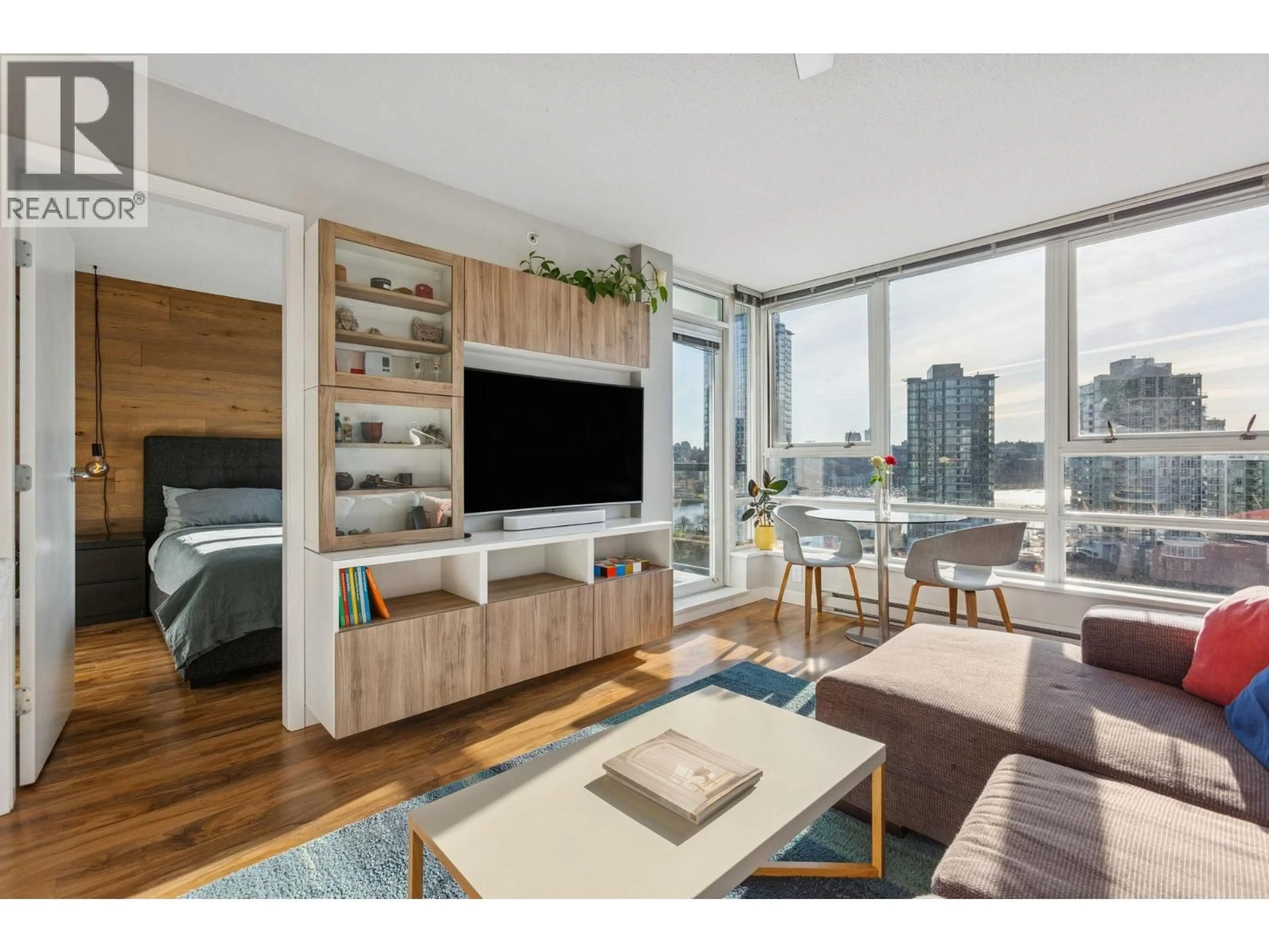 Living room with furniture, wood/laminate floor for 1711 - 939 EXPO BOULEVARD, Vancouver British Columbia V6Z3G7