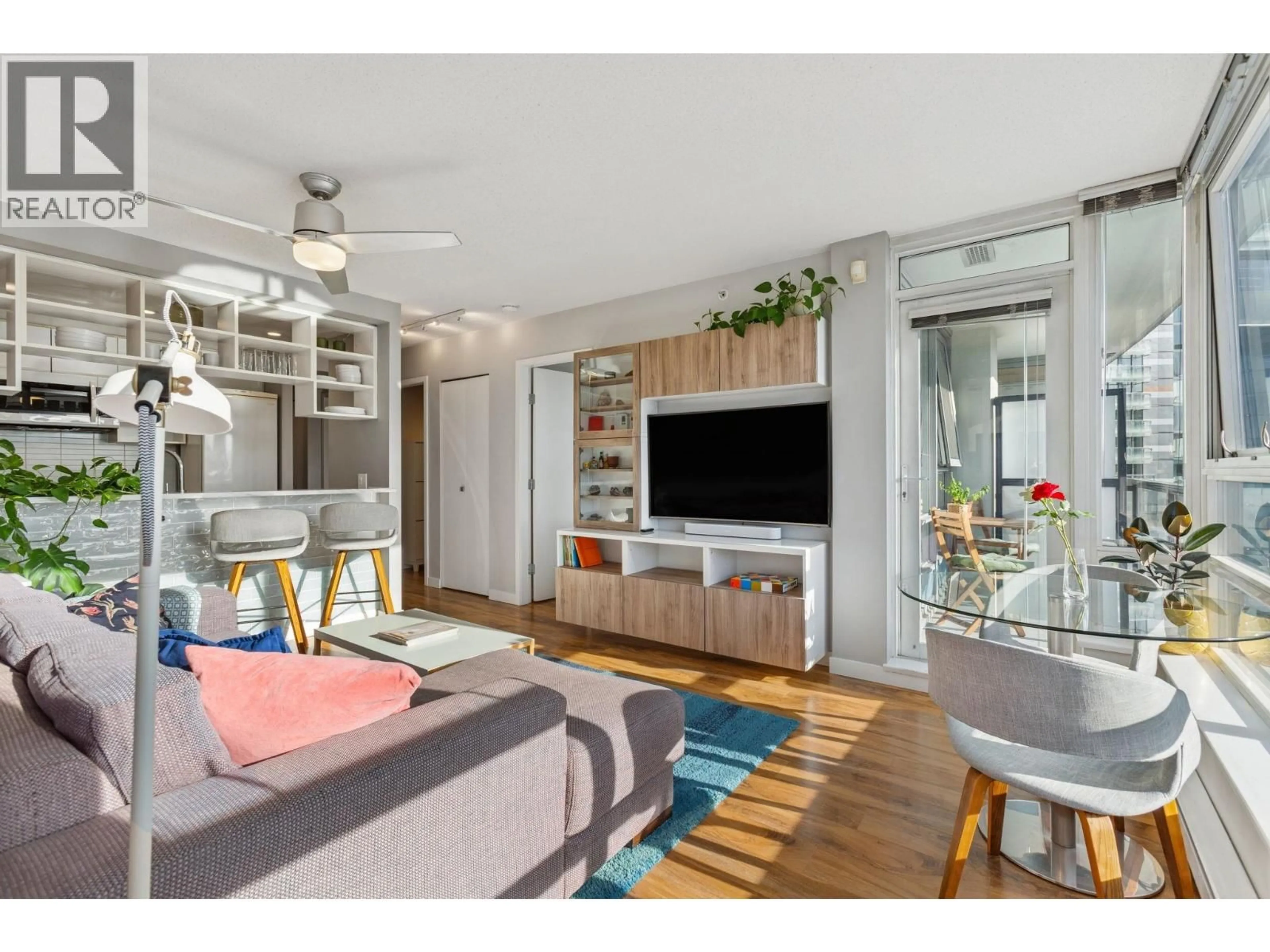 Living room with furniture, wood/laminate floor for 1711 - 939 EXPO BOULEVARD, Vancouver British Columbia V6Z3G7