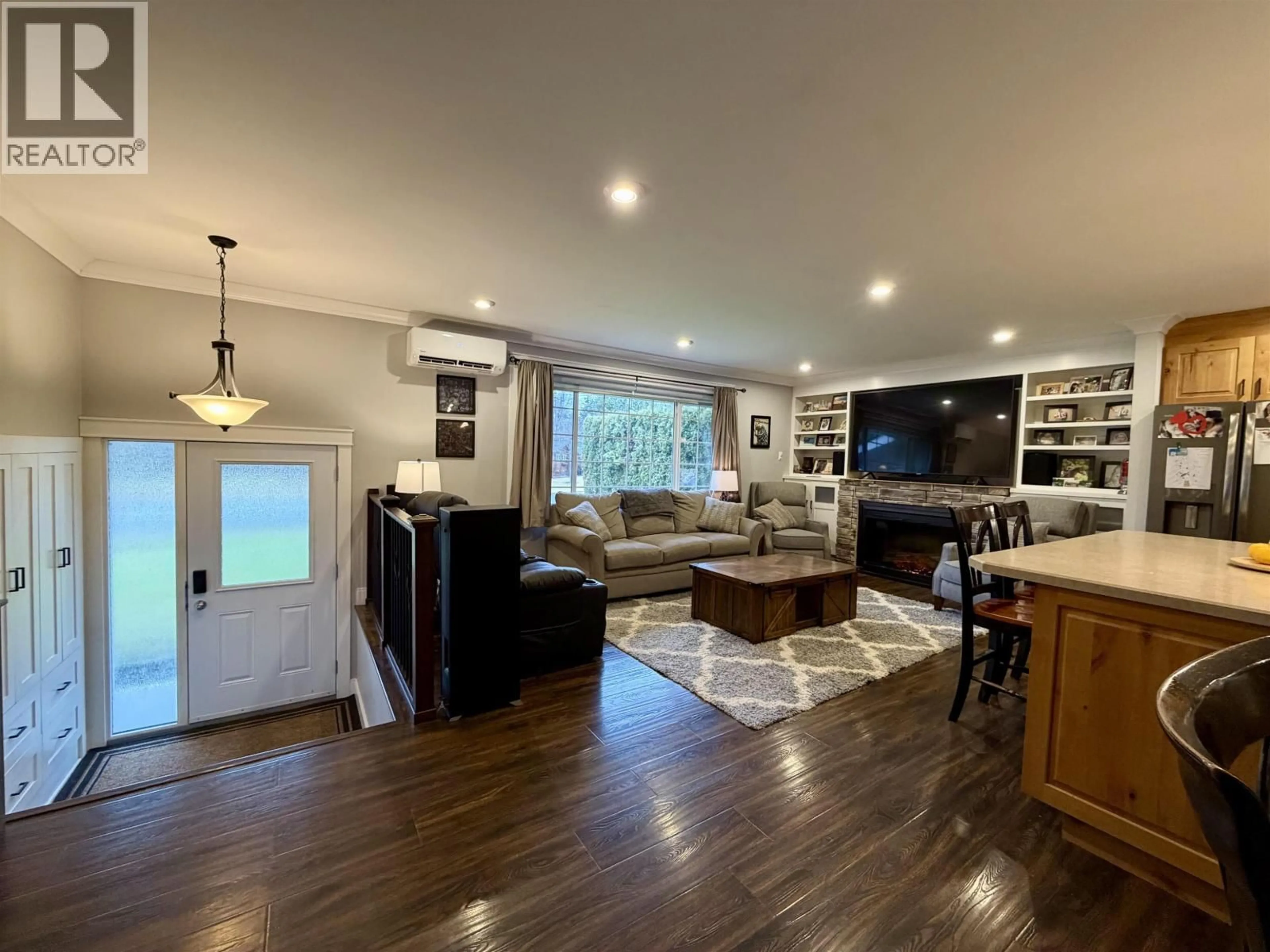 Living room with furniture, wood/laminate floor for 2090 CHURCHILL DRIVE, Terrace British Columbia V8G0E8