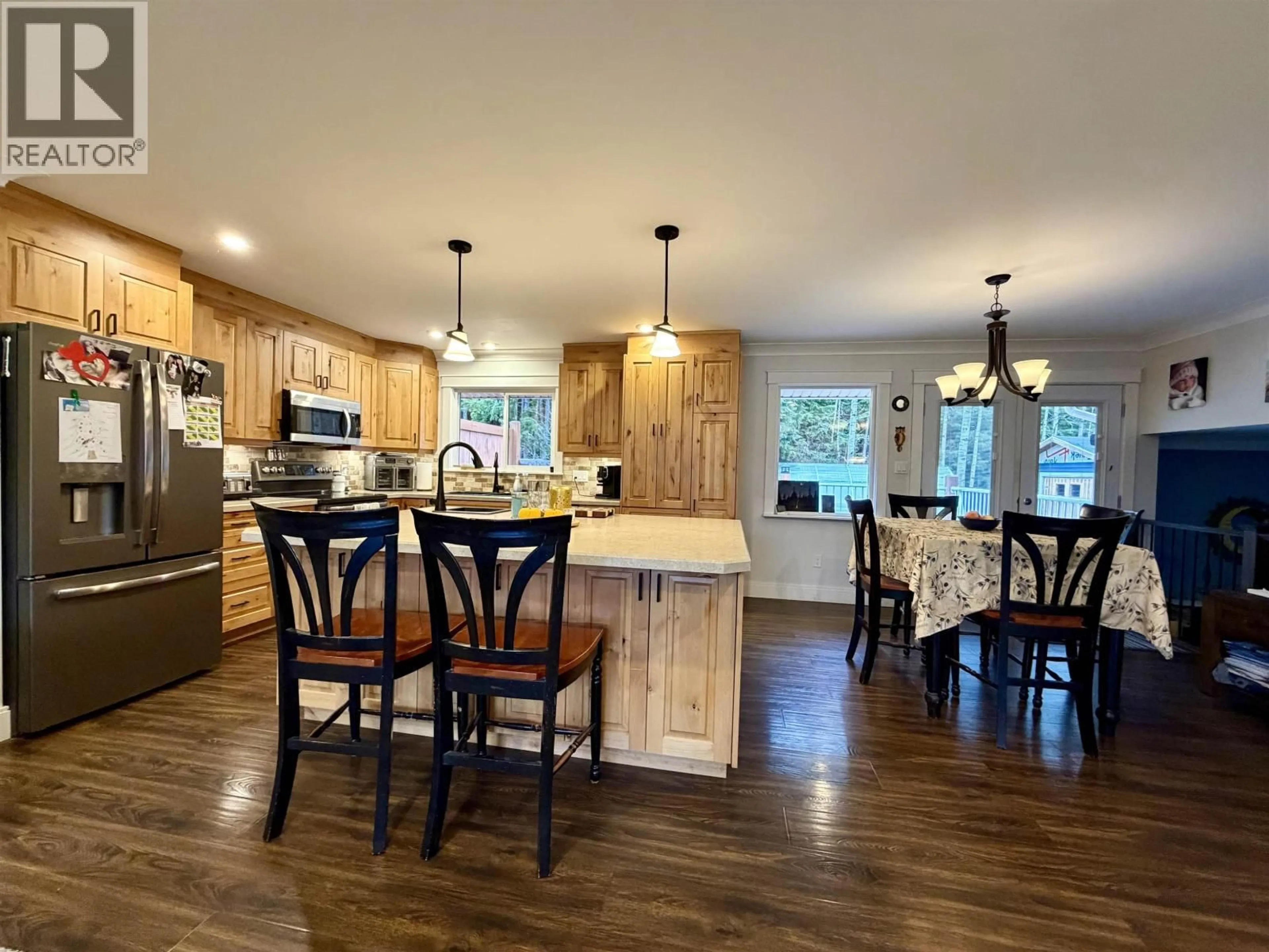 Open concept kitchen, wood/laminate floor for 2090 CHURCHILL DRIVE, Terrace British Columbia V8G0E8