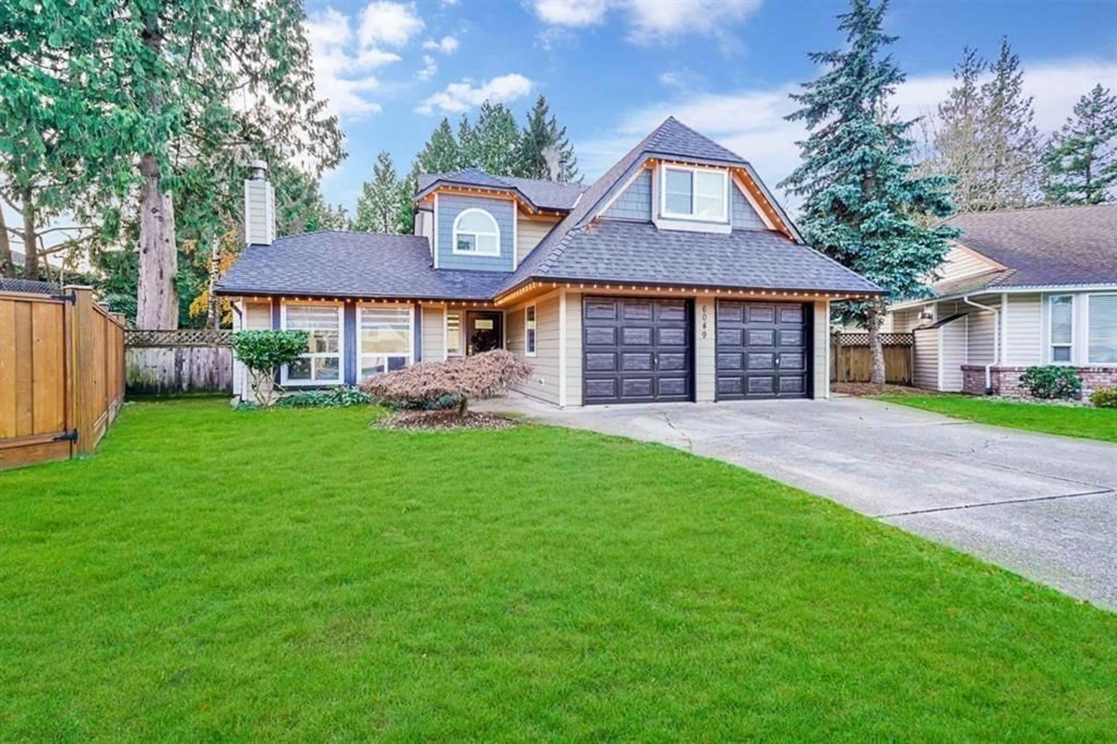 Home with vinyl exterior material, street for 6049 133A STREET, Surrey British Columbia V3X2K3