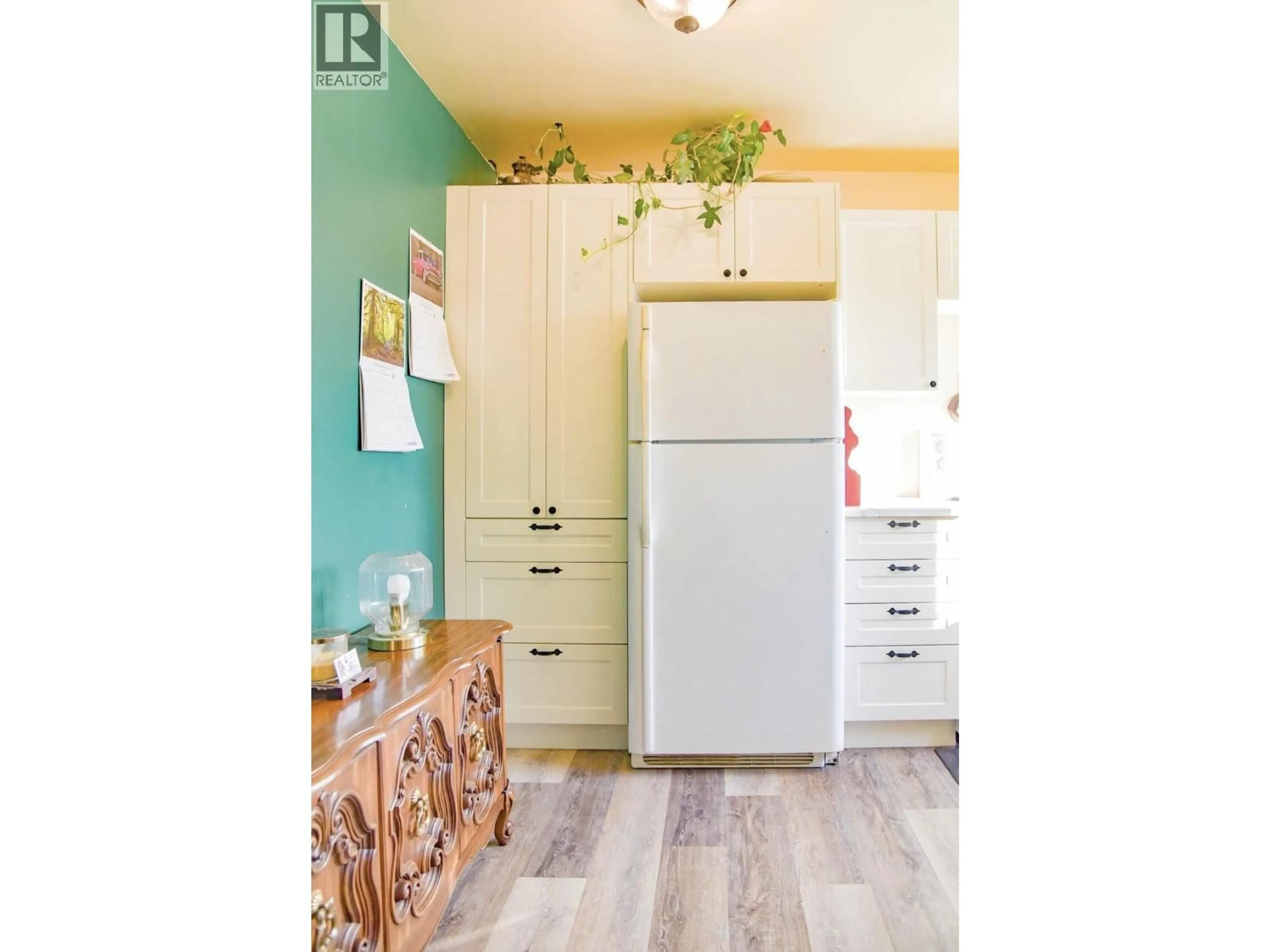 Open concept kitchen, wood/laminate floor for 125 - 4529 STRAUME AVENUE, Terrace British Columbia V8G2C1