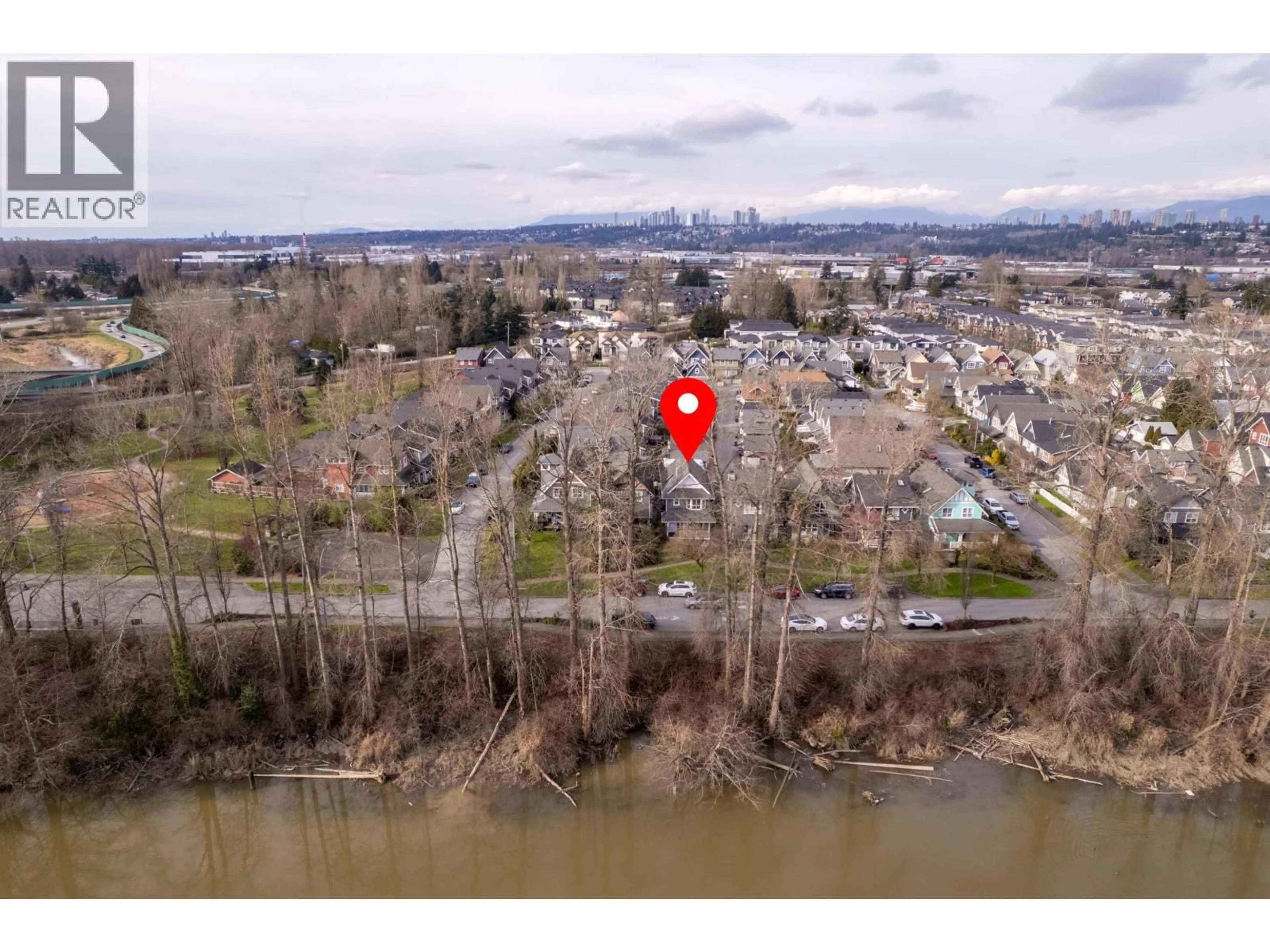 A pic from outside/outdoor area/front of a property/back of a property/a pic from drone, water/lake/river/ocean view for 1455 SOUTH DYKE ROAD, New Westminster British Columbia V3M7A2