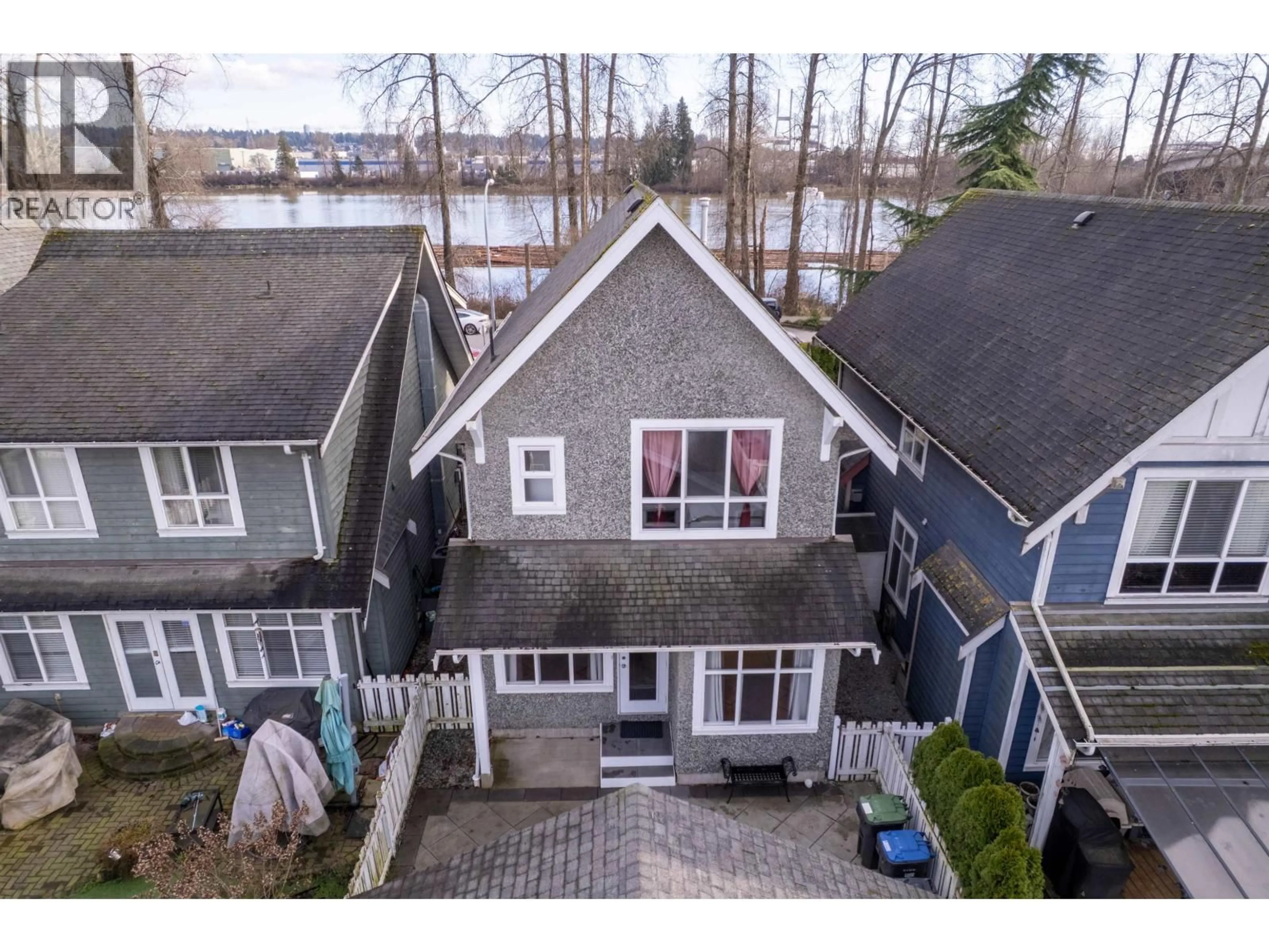 A pic from outside/outdoor area/front of a property/back of a property/a pic from drone, water/lake/river/ocean view for 1455 SOUTH DYKE ROAD, New Westminster British Columbia V3M7A2