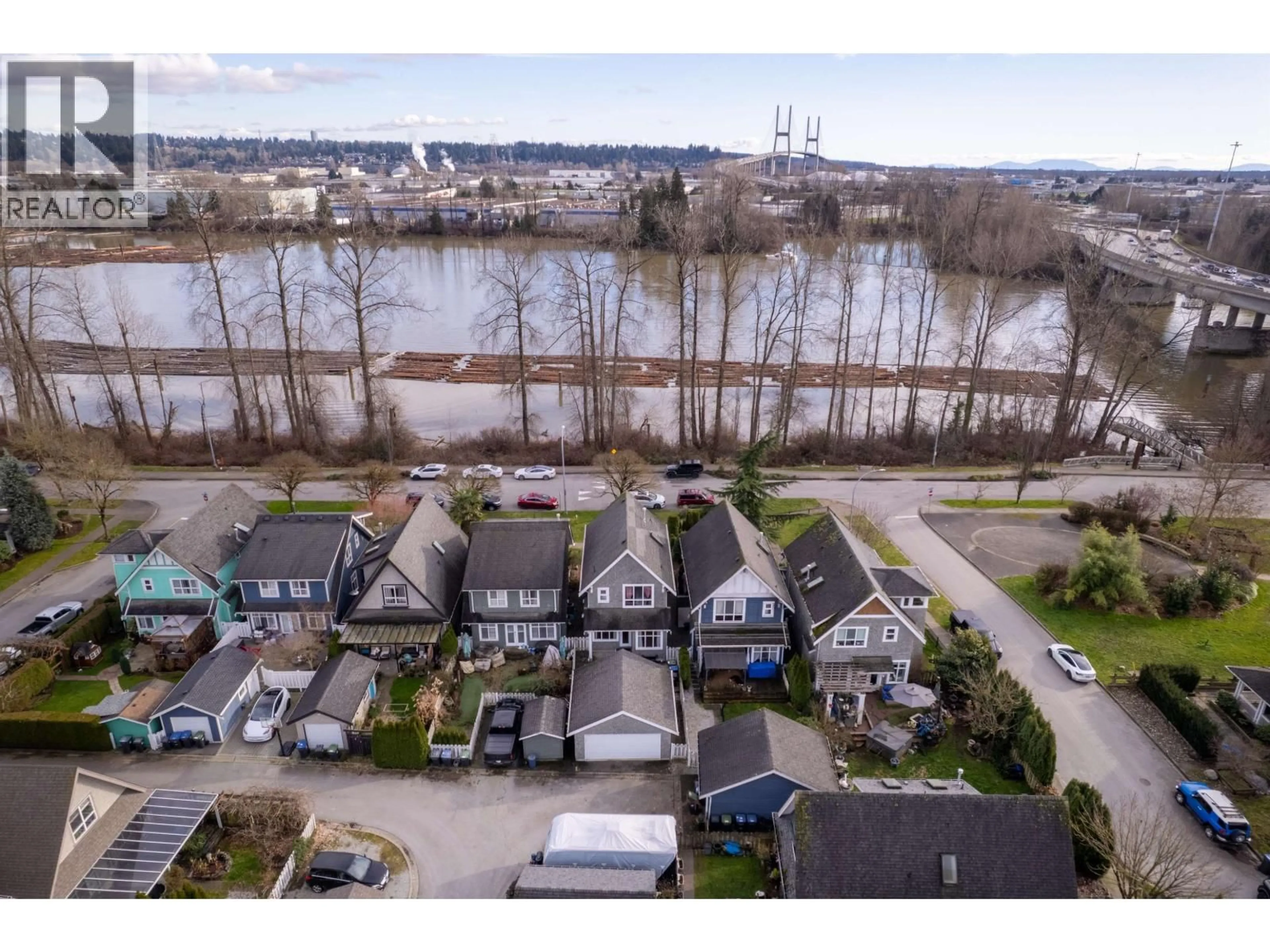 A pic from outside/outdoor area/front of a property/back of a property/a pic from drone, water/lake/river/ocean view for 1455 SOUTH DYKE ROAD, New Westminster British Columbia V3M7A2