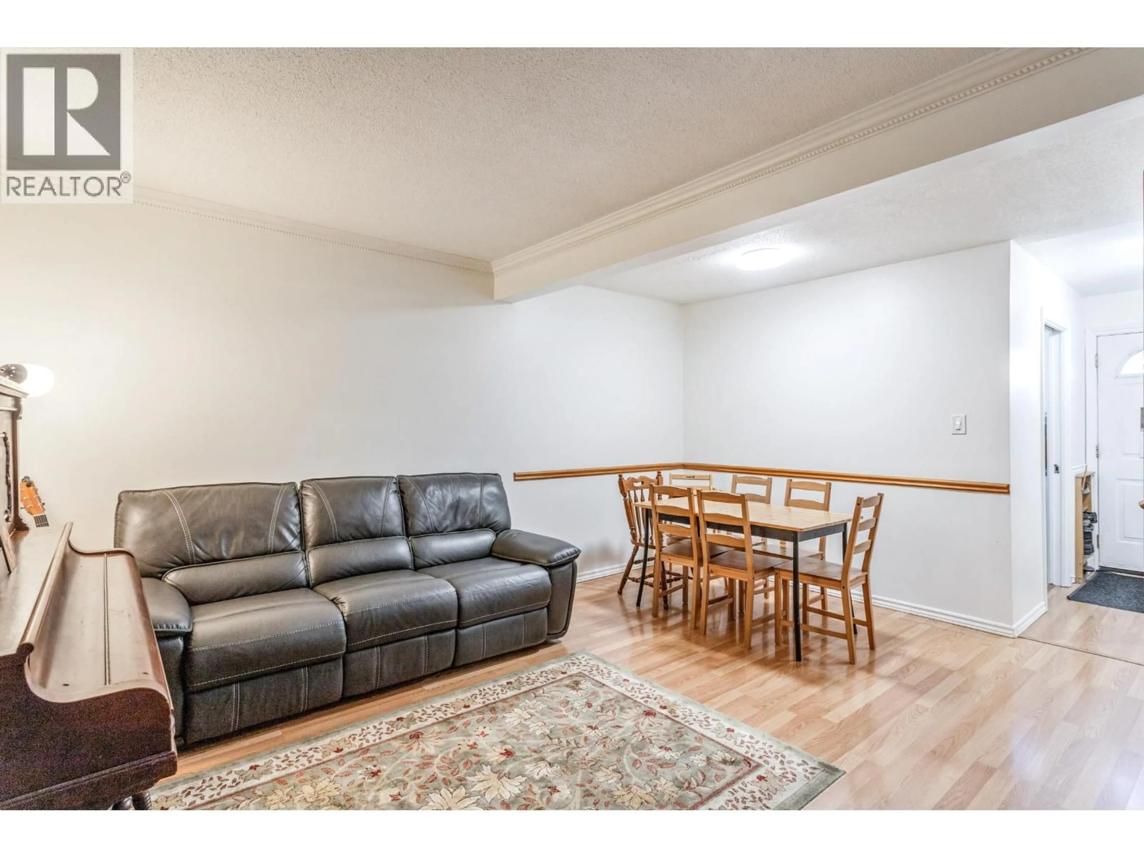 Living room with furniture, wood/laminate floor for 8918 GANYMEDE PLACE, Burnaby British Columbia V3J1A1