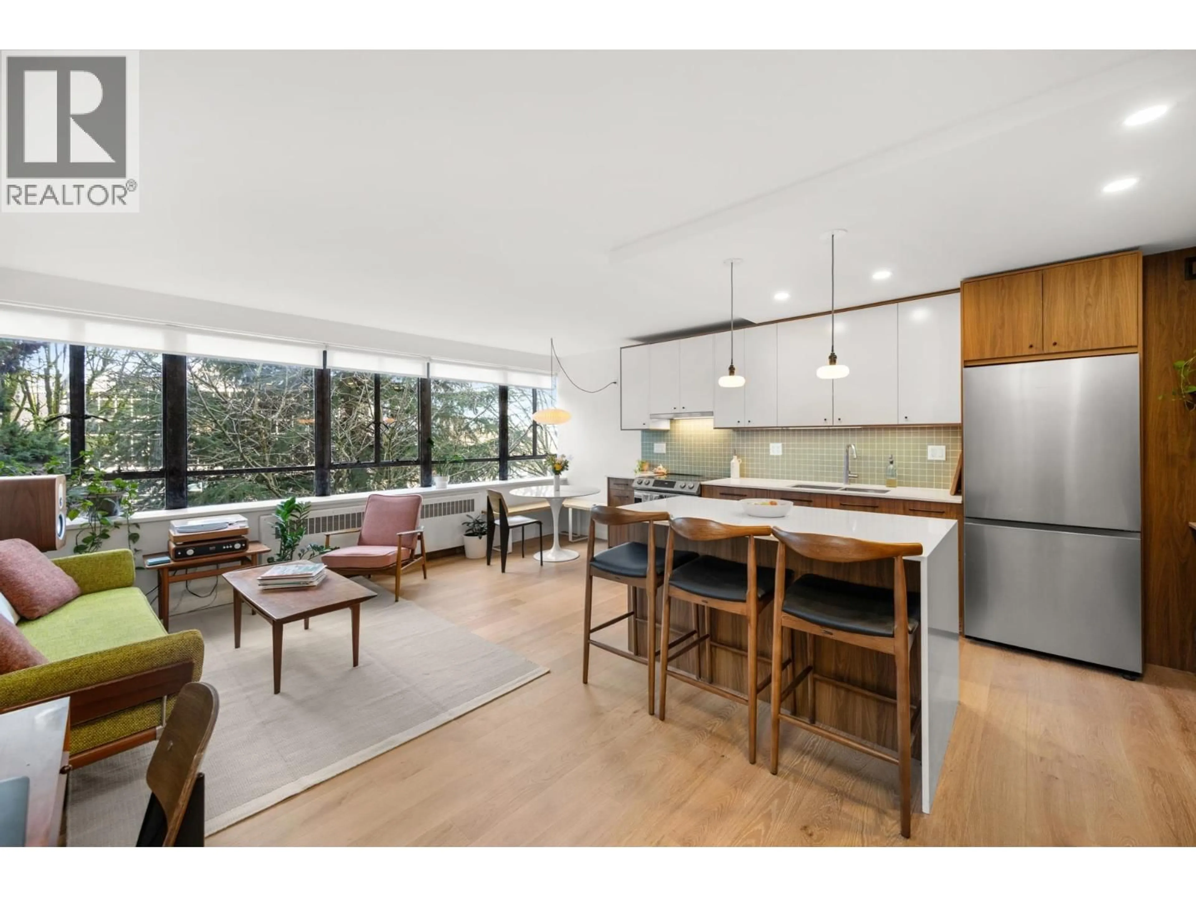 Open concept kitchen, unknown for 320 - 1445 MARPOLE AVENUE, Vancouver British Columbia V6H1S5