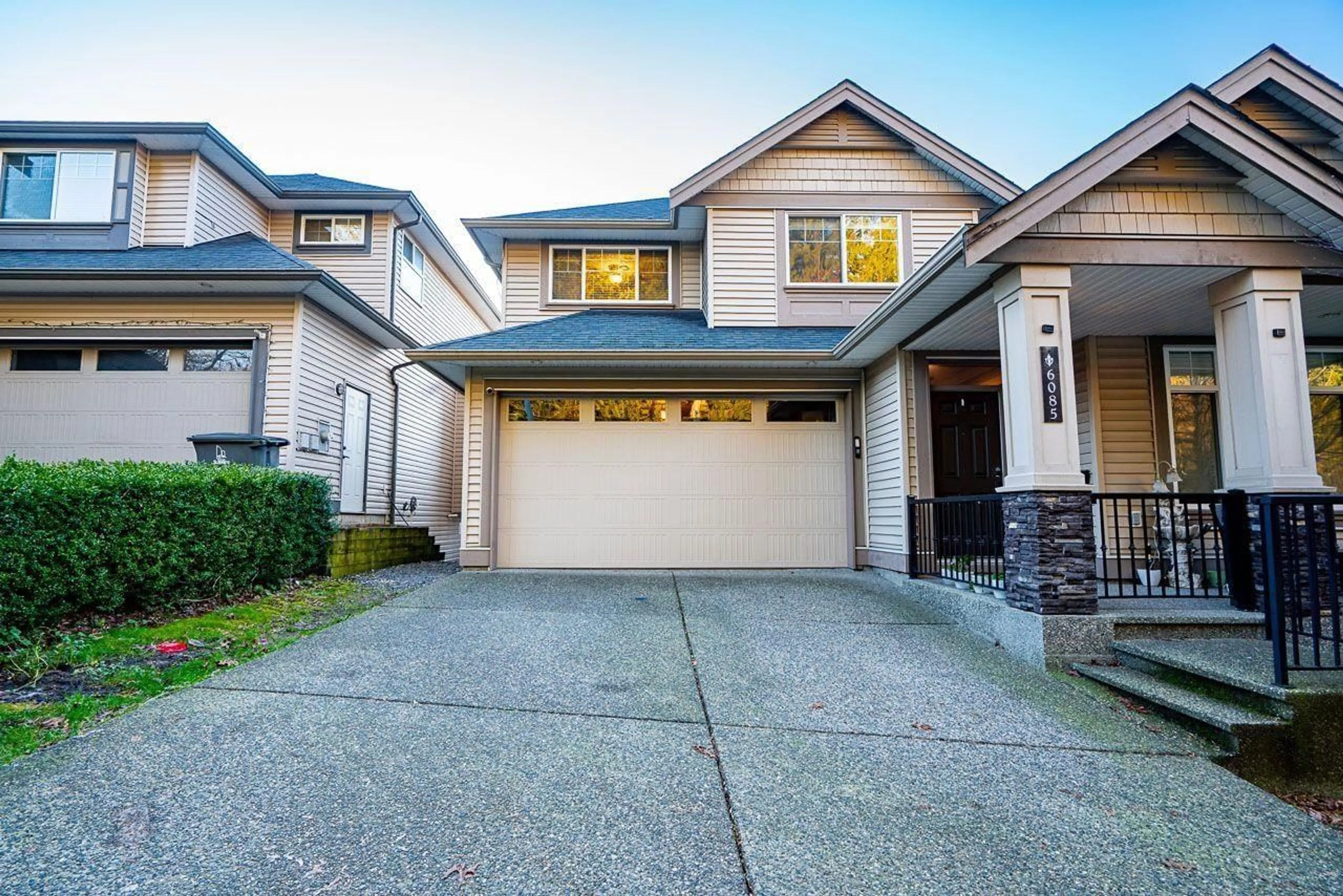 Home with vinyl exterior material, street for 6085 146 STREET, Surrey British Columbia V3S3A1