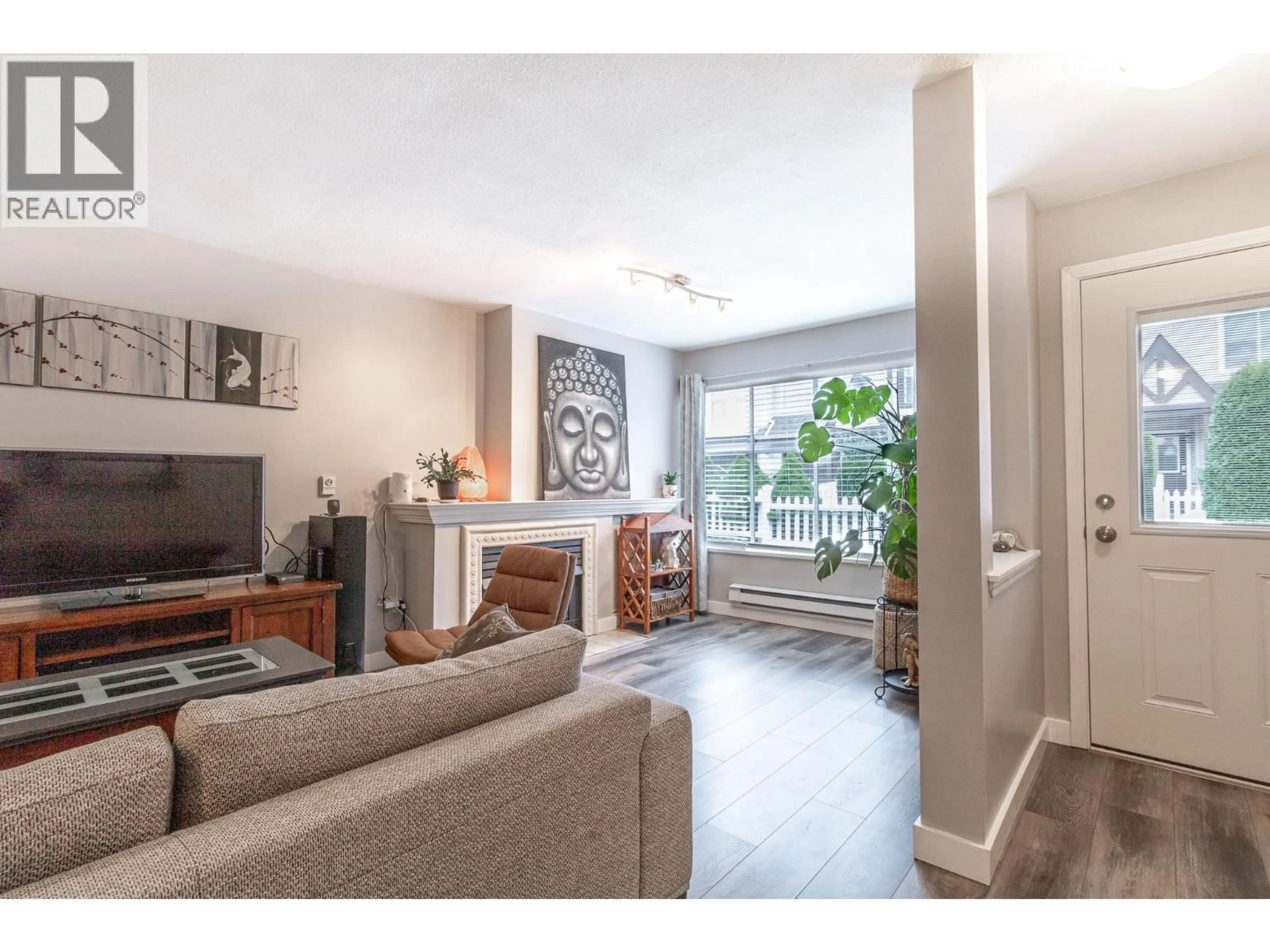 Living room with furniture, wood/laminate floor for 41 - 12099 237 STREET, Maple Ridge British Columbia V4R2C3