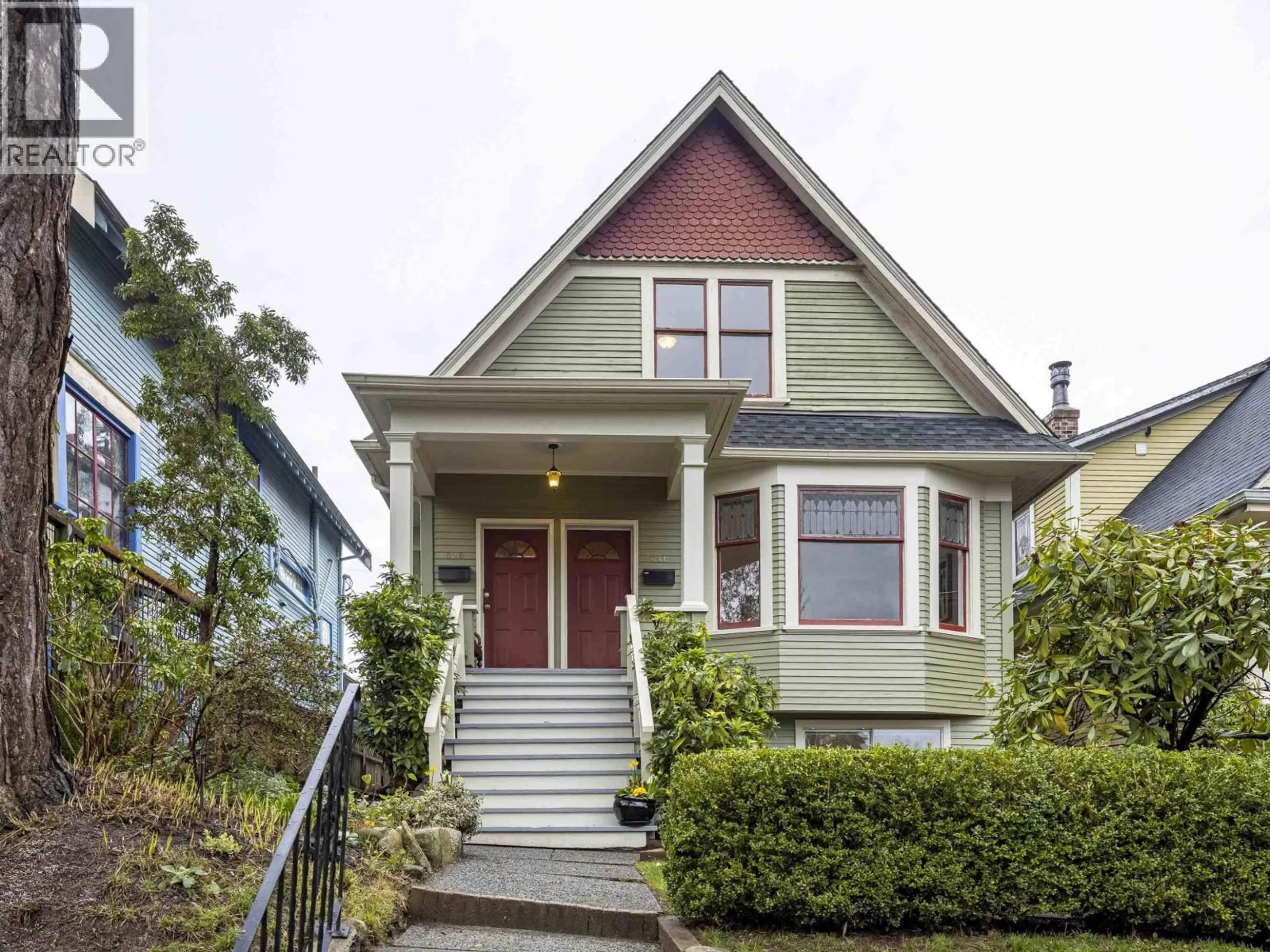 Home with vinyl exterior material, street for 829 14TH AVENUE, Vancouver British Columbia V5T2N5