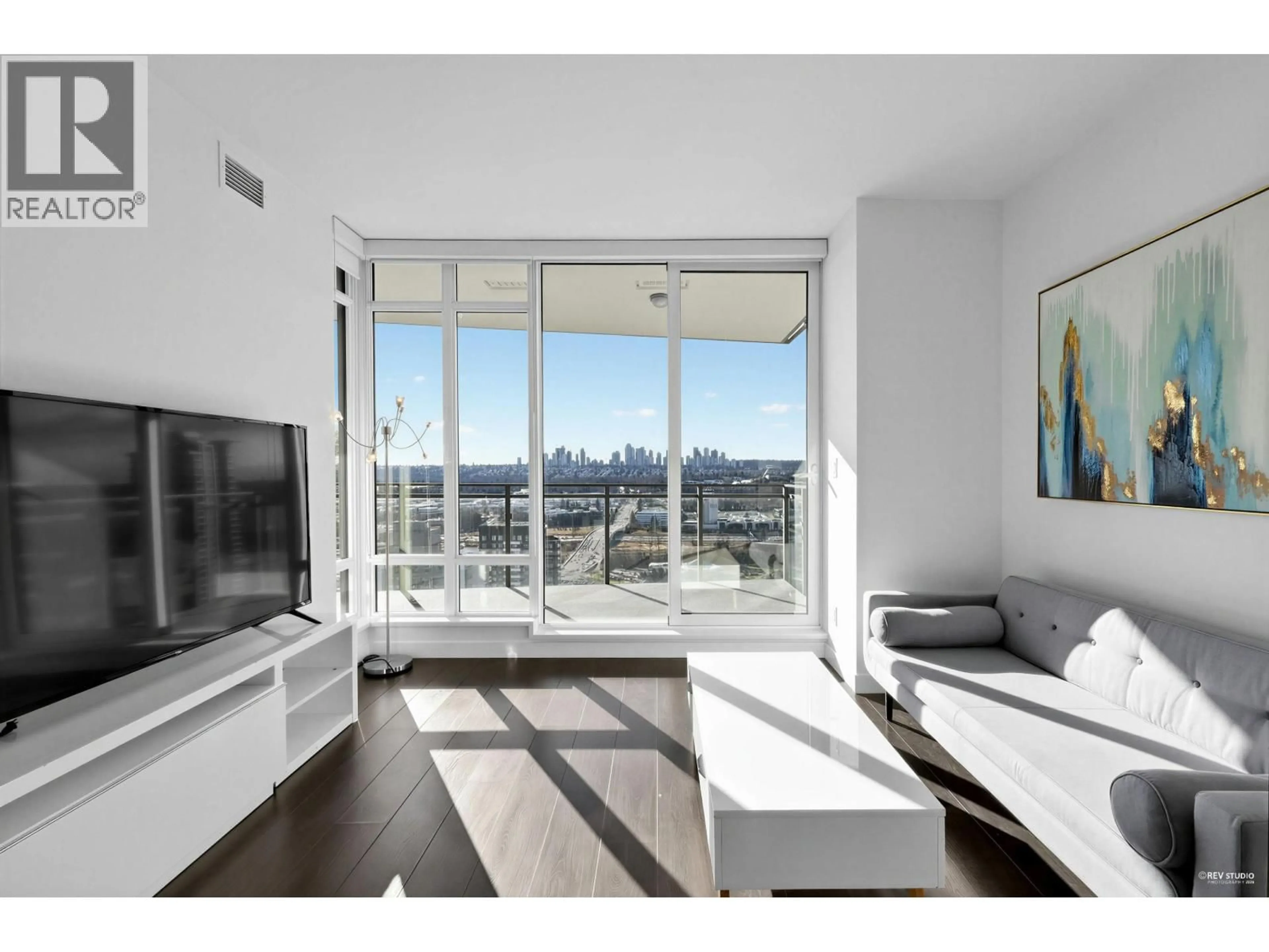 Living room with furniture, wood/laminate floor for 2907 - 2085 SKYLINE COURT, Burnaby British Columbia V5C0M6