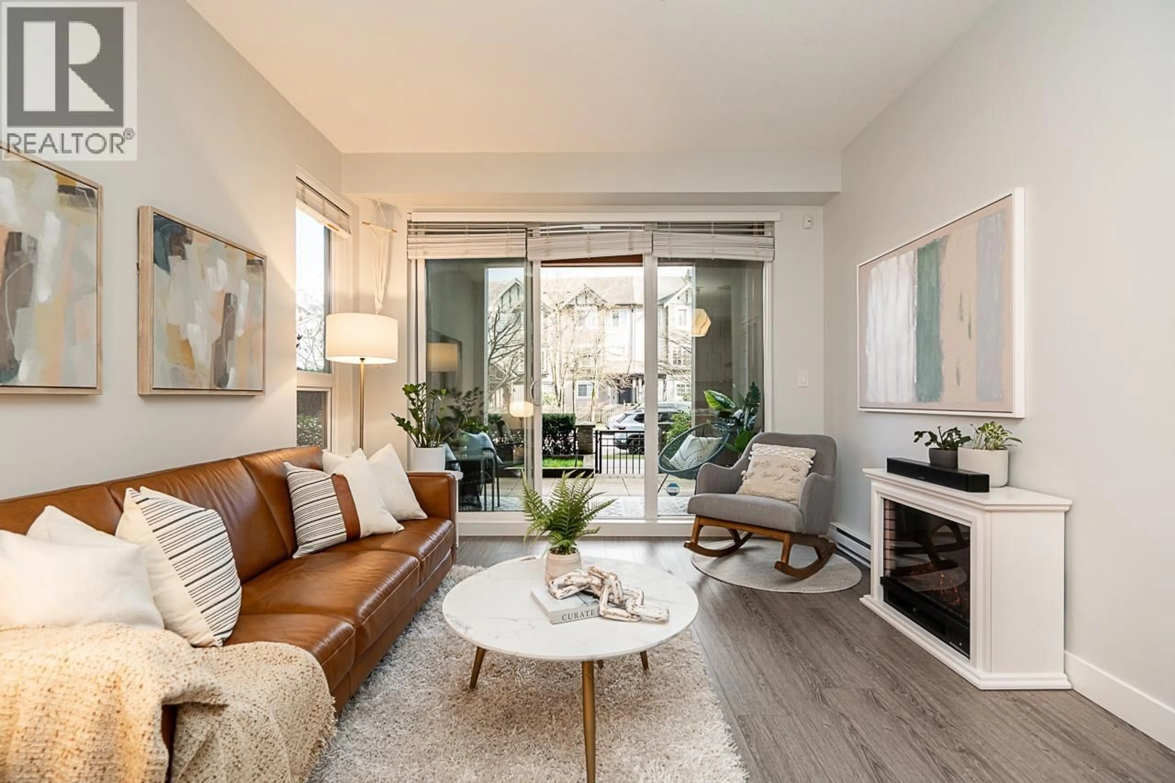 Living room with furniture, unknown for 210 - 3399 NOEL DRIVE, Burnaby British Columbia V3J0G8