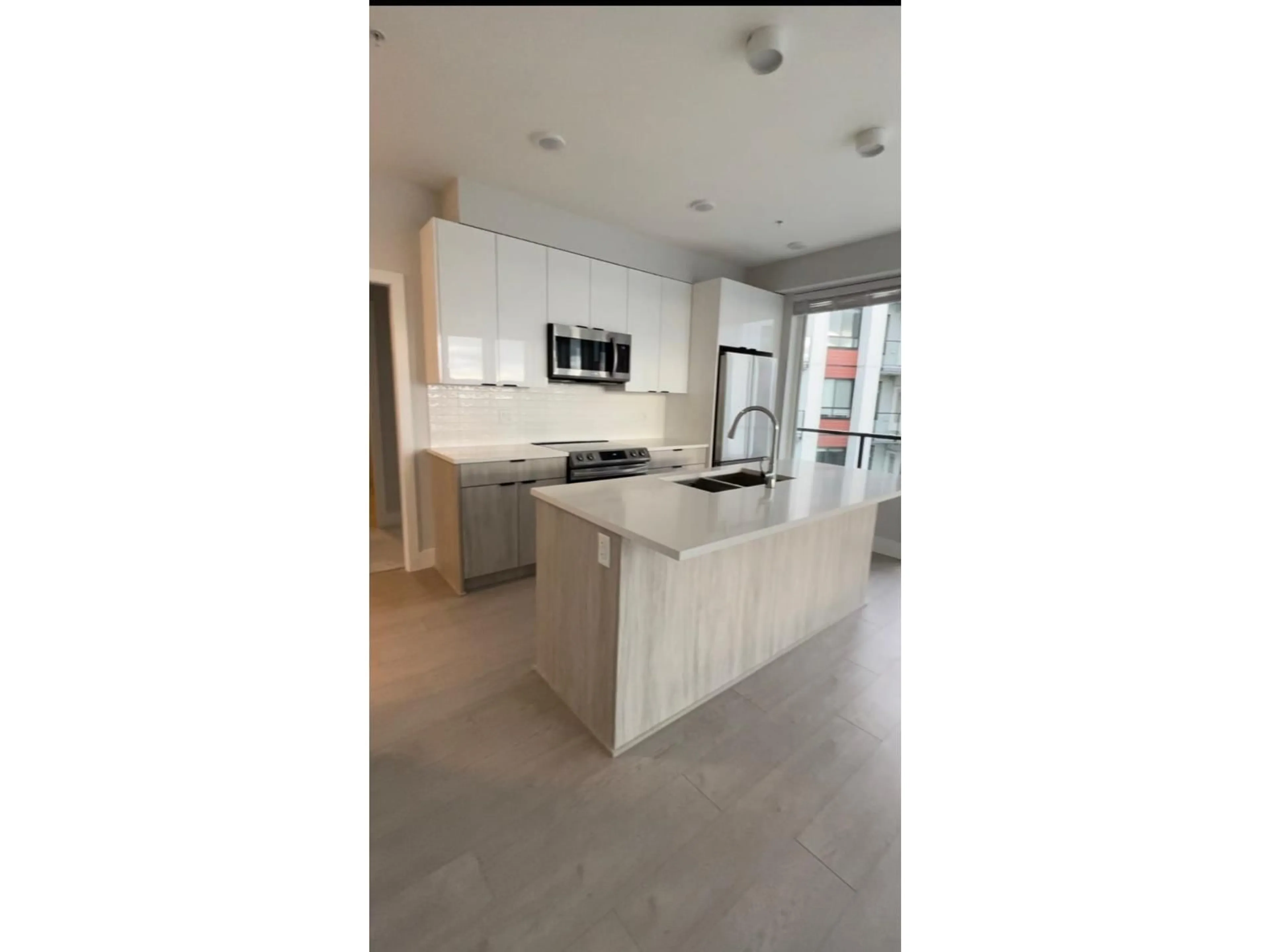 Open concept kitchen, ceramic/tile floor for 504 - 20360 LOGAN AVENUE, Langley British Columbia V3A4L8