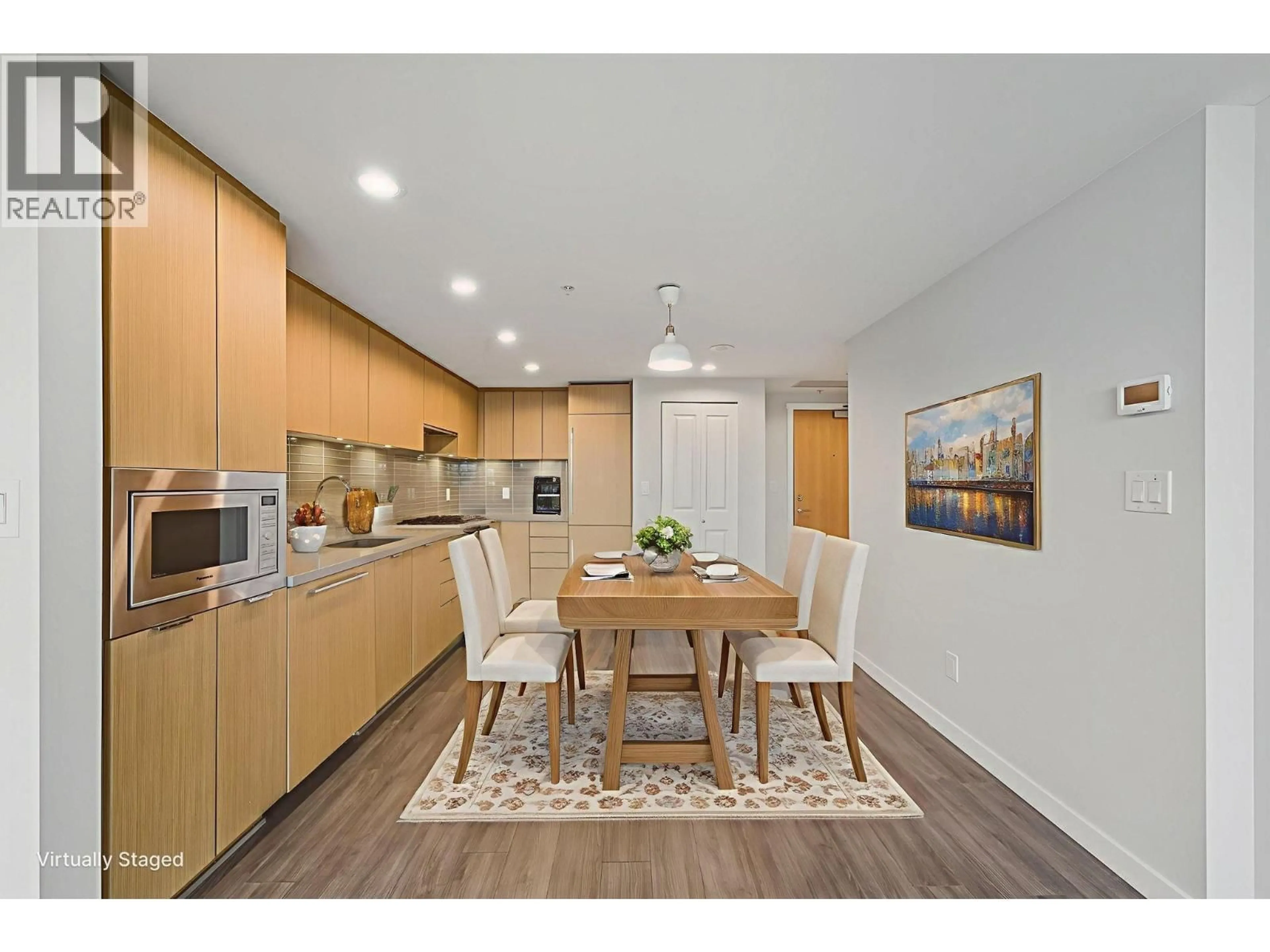 Open concept kitchen, wood/laminate floor for 715 - 8333 SWEET AVENUE, Richmond British Columbia V6X0P4