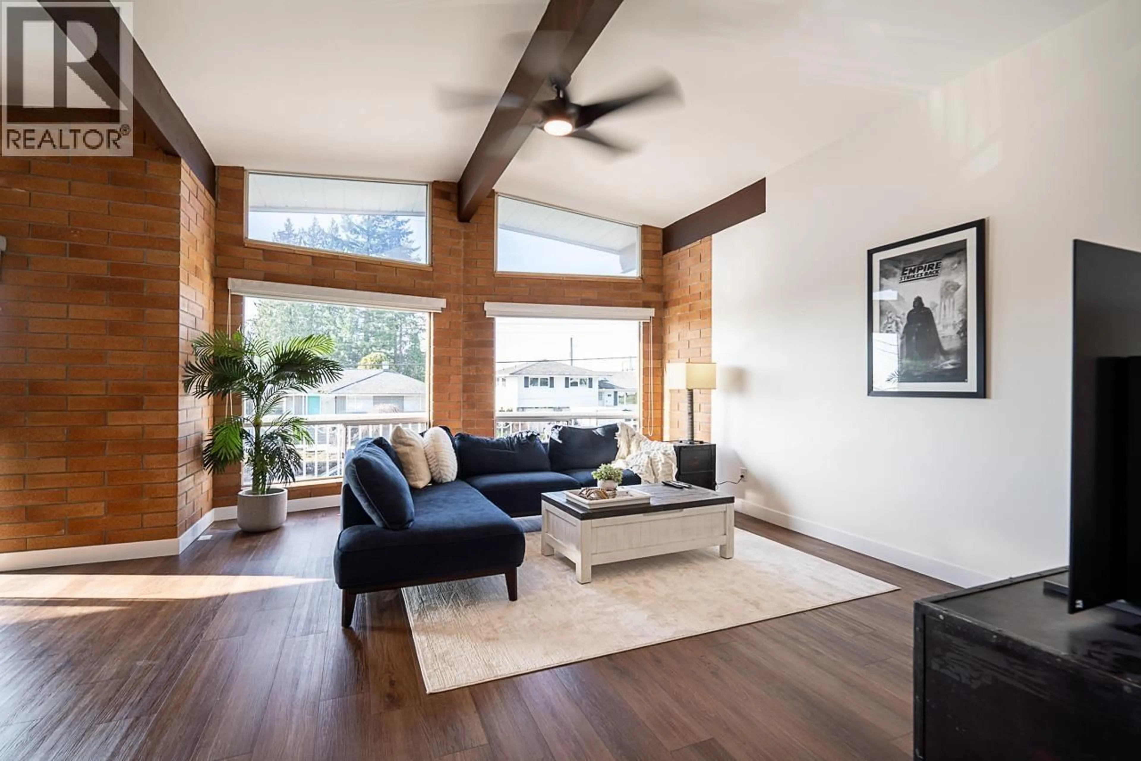 Living room with furniture, wood/laminate floor for 220 GROSVENOR AVENUE, Burnaby British Columbia V5B1J4