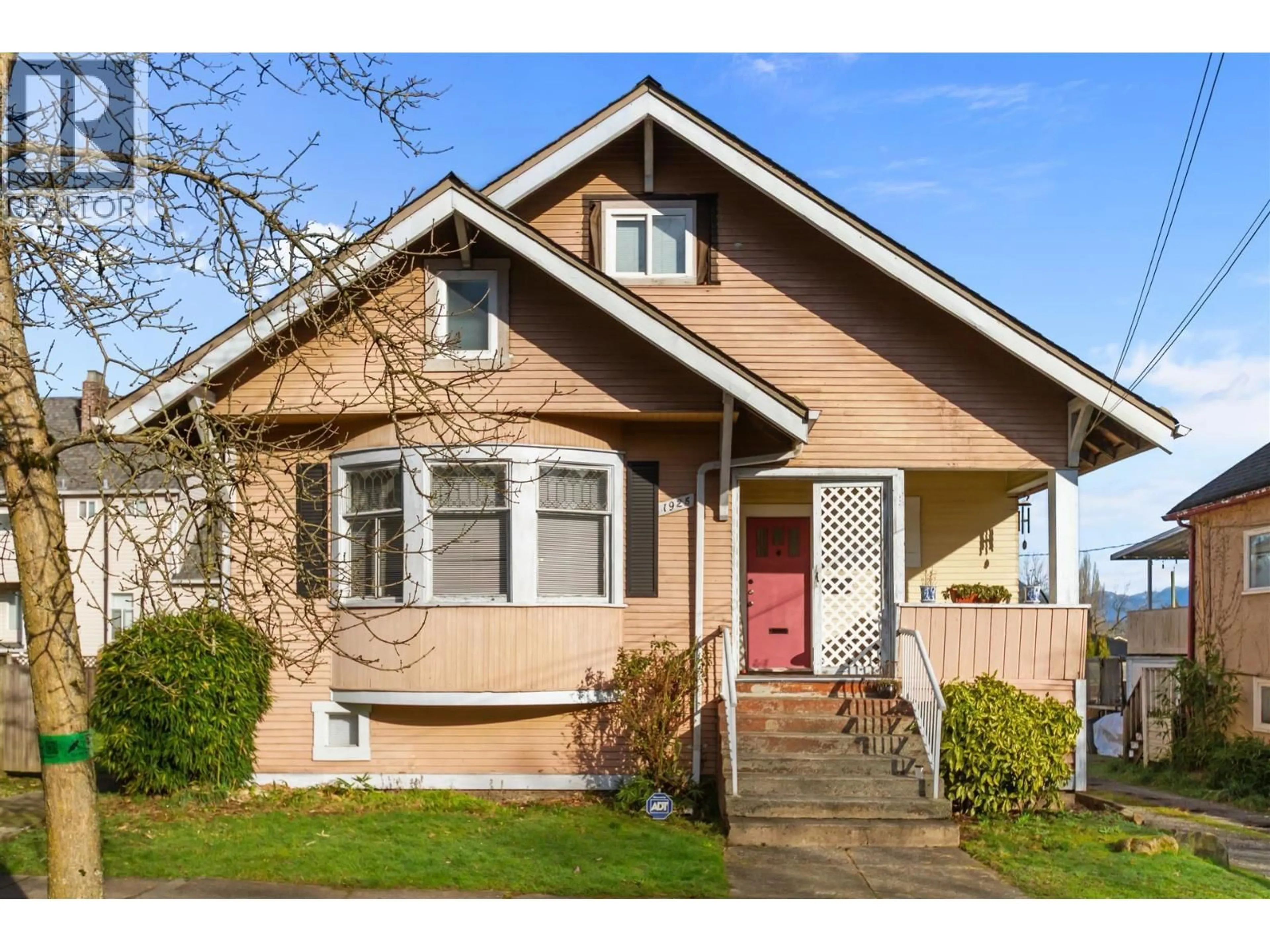 Home with vinyl exterior material, street for 1925 ADANAC STREET, Vancouver British Columbia V5L2E5