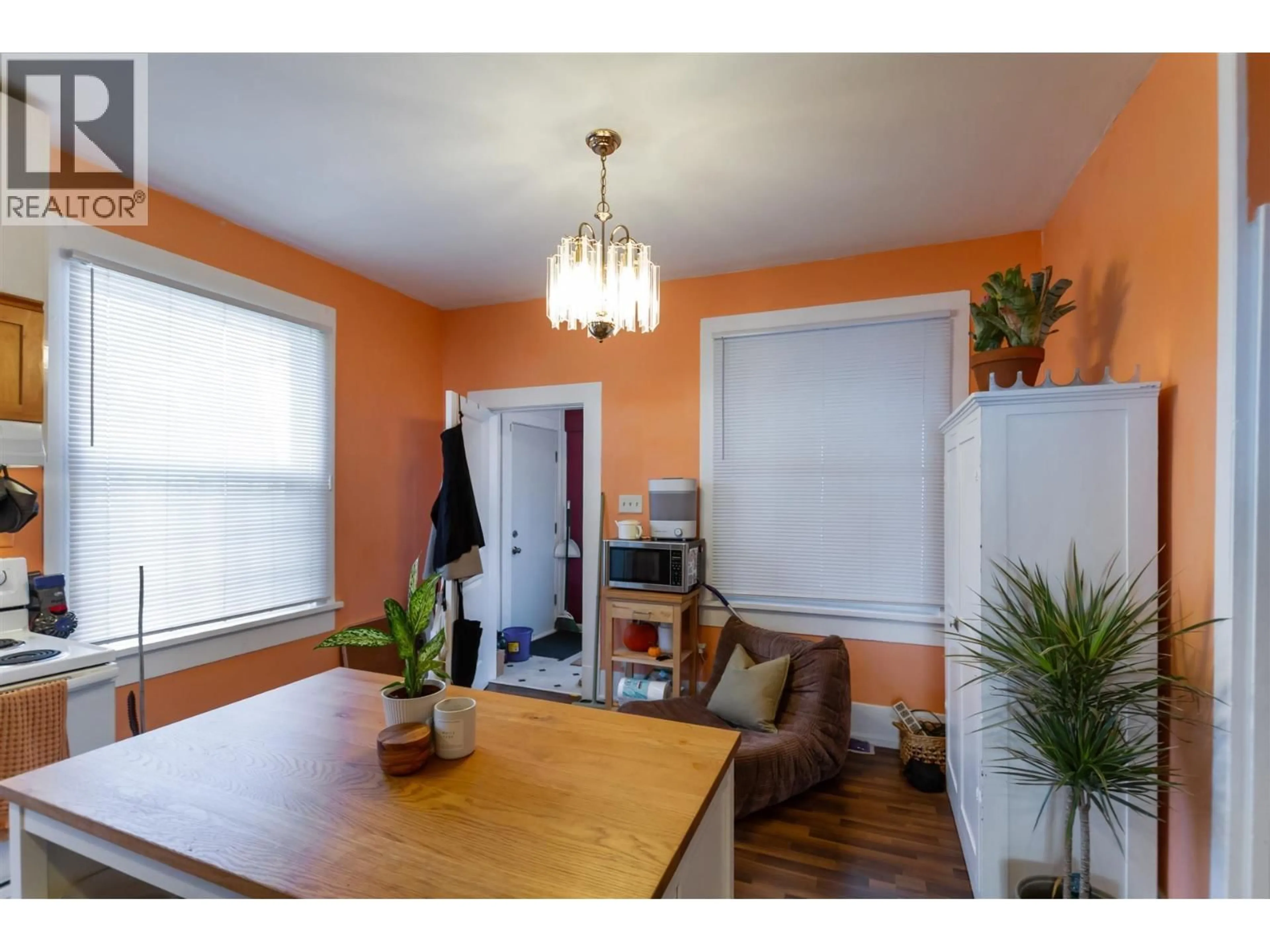 Dining room, wood/laminate floor for 1925 ADANAC STREET, Vancouver British Columbia V5L2E5