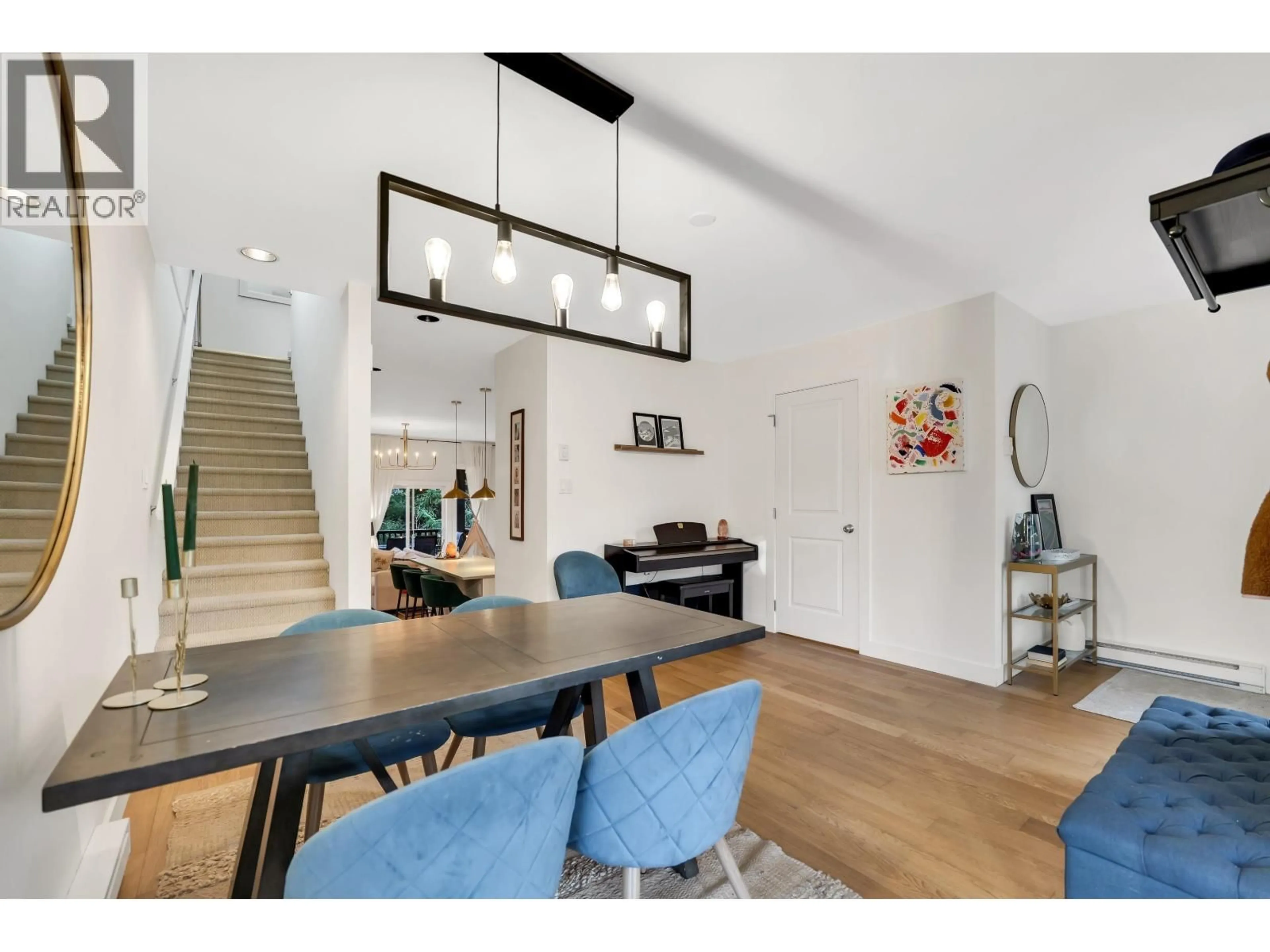 Open concept kitchen, wood/laminate floor for 21 - 40137 GOVERNMENT ROAD, Squamish British Columbia V8B0N7