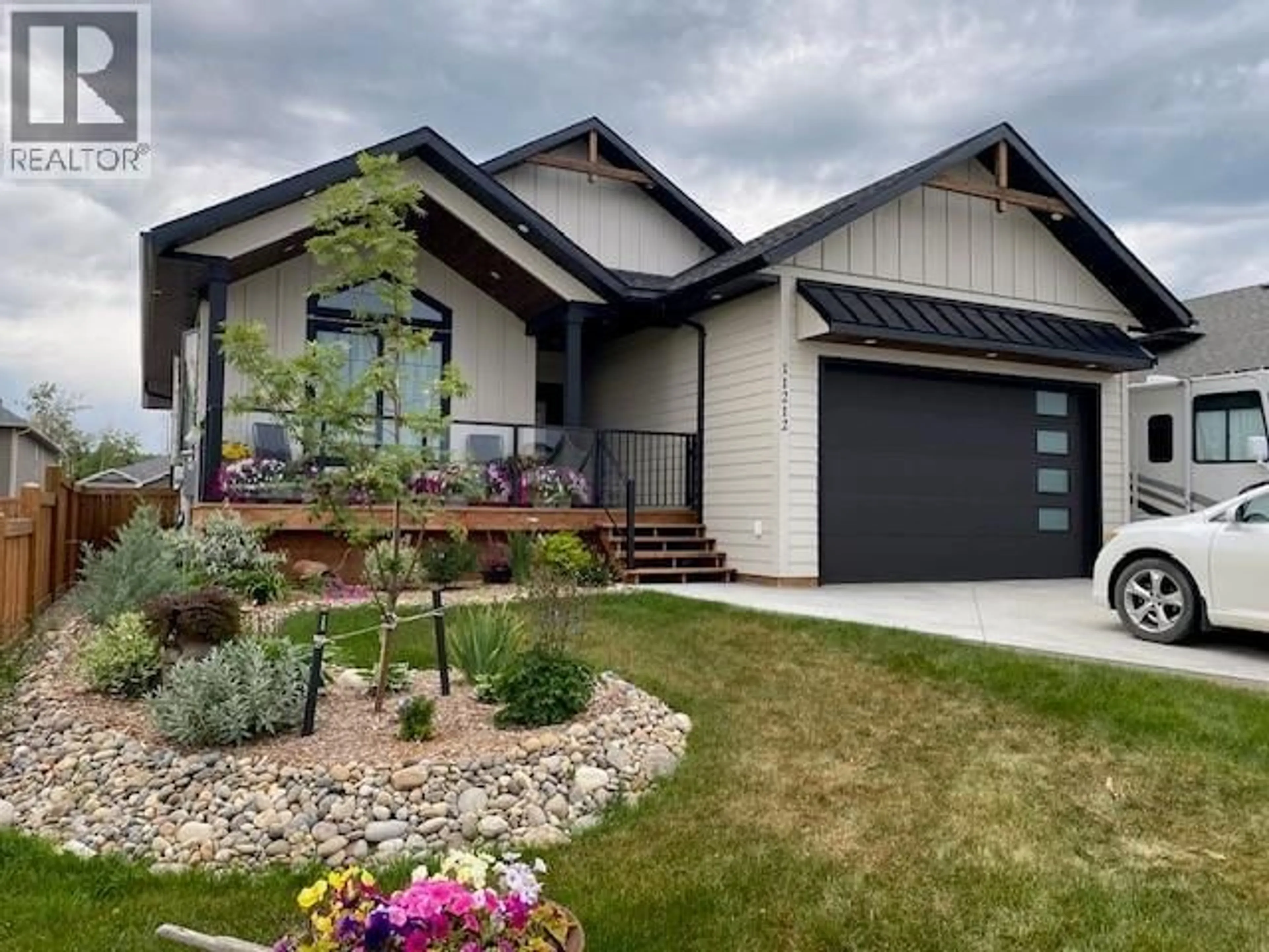 Home with vinyl exterior material, street for 11212 114 AVENUE, Fort St. John British Columbia V1J0R5