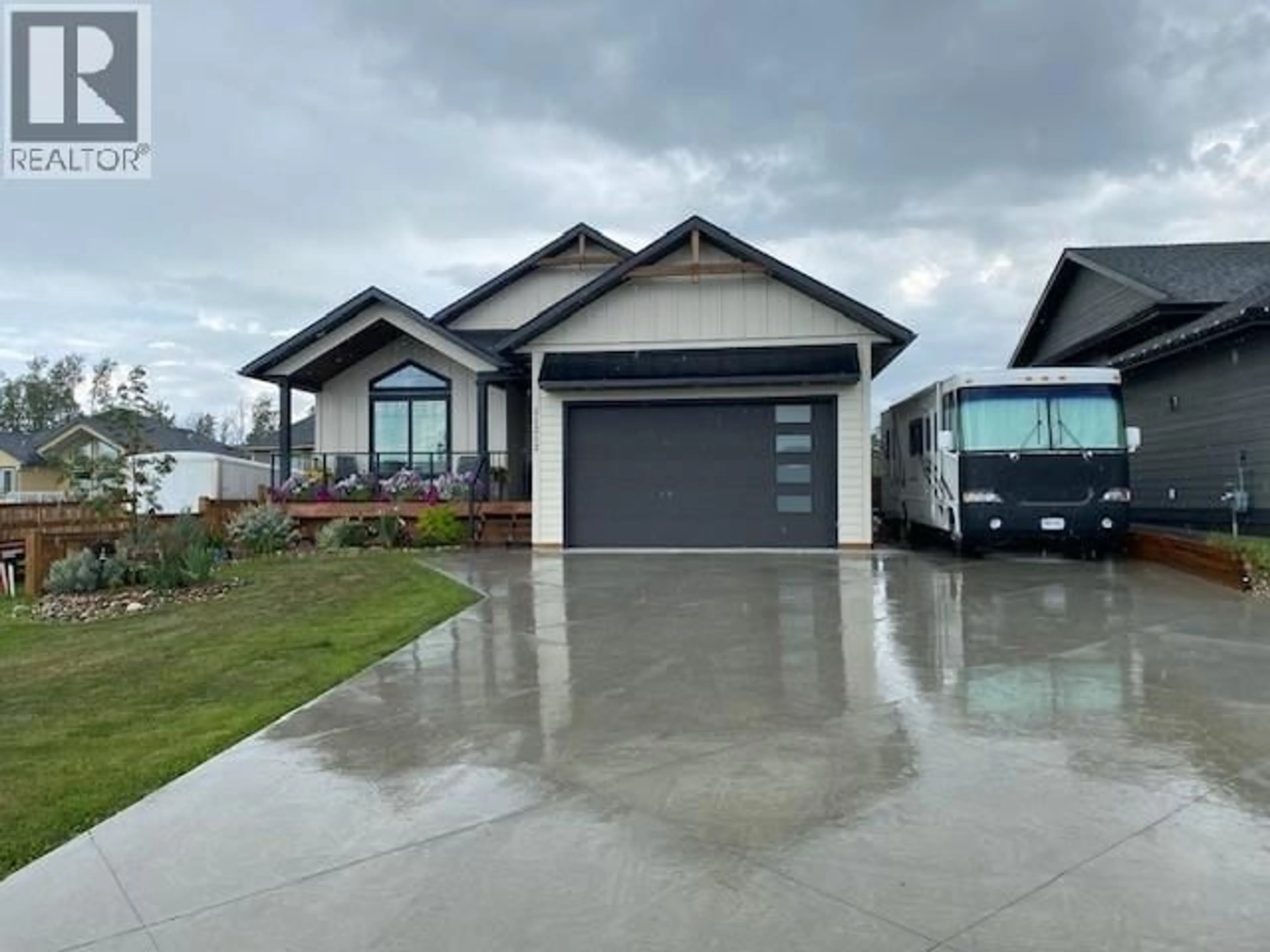 Home with vinyl exterior material, street for 11212 114 AVENUE, Fort St. John British Columbia V1J0R5