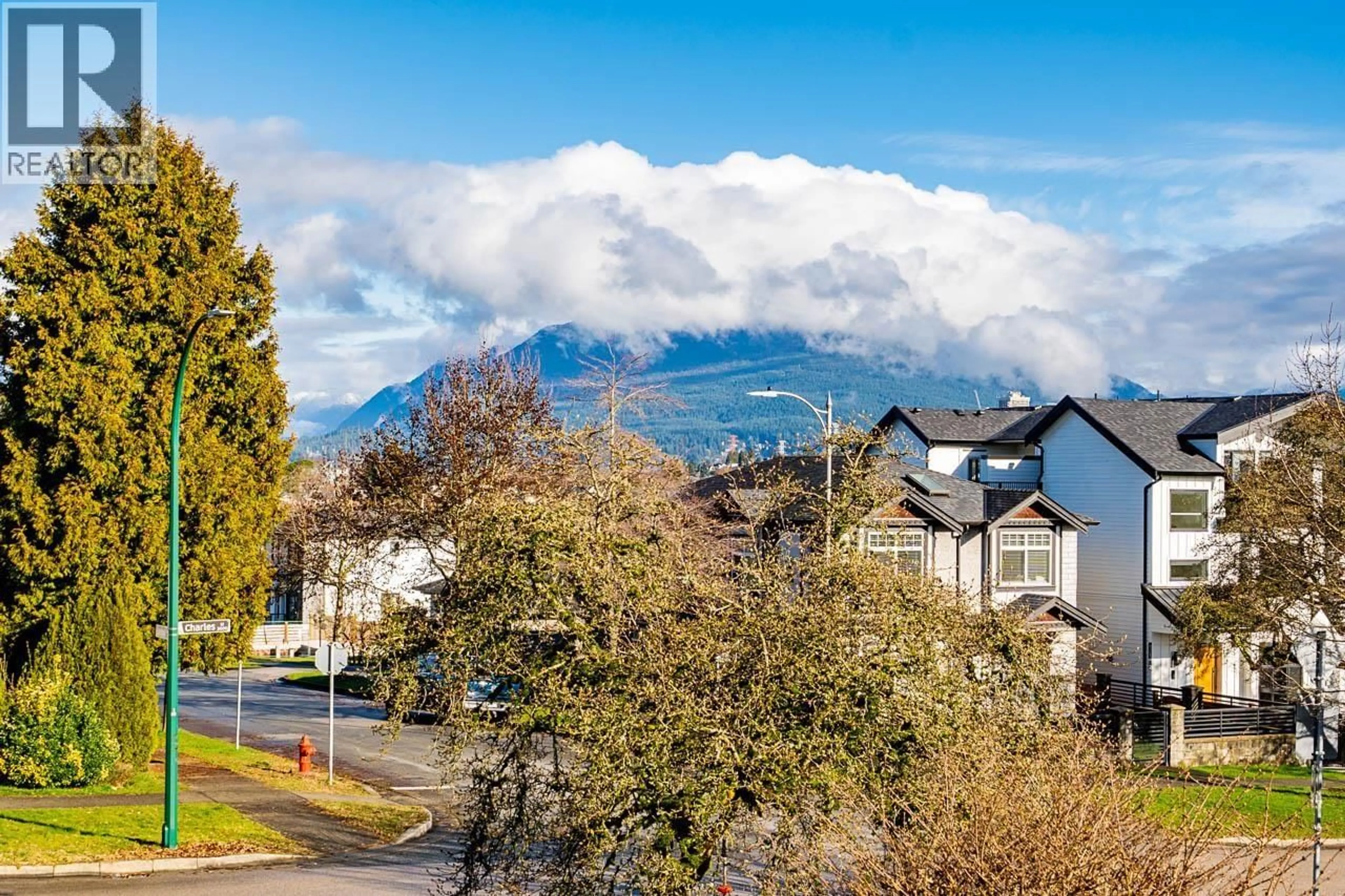 A pic from outside/outdoor area/front of a property/back of a property/a pic from drone, mountain view for 3038 CHARLES STREET, Vancouver British Columbia V5K3B5