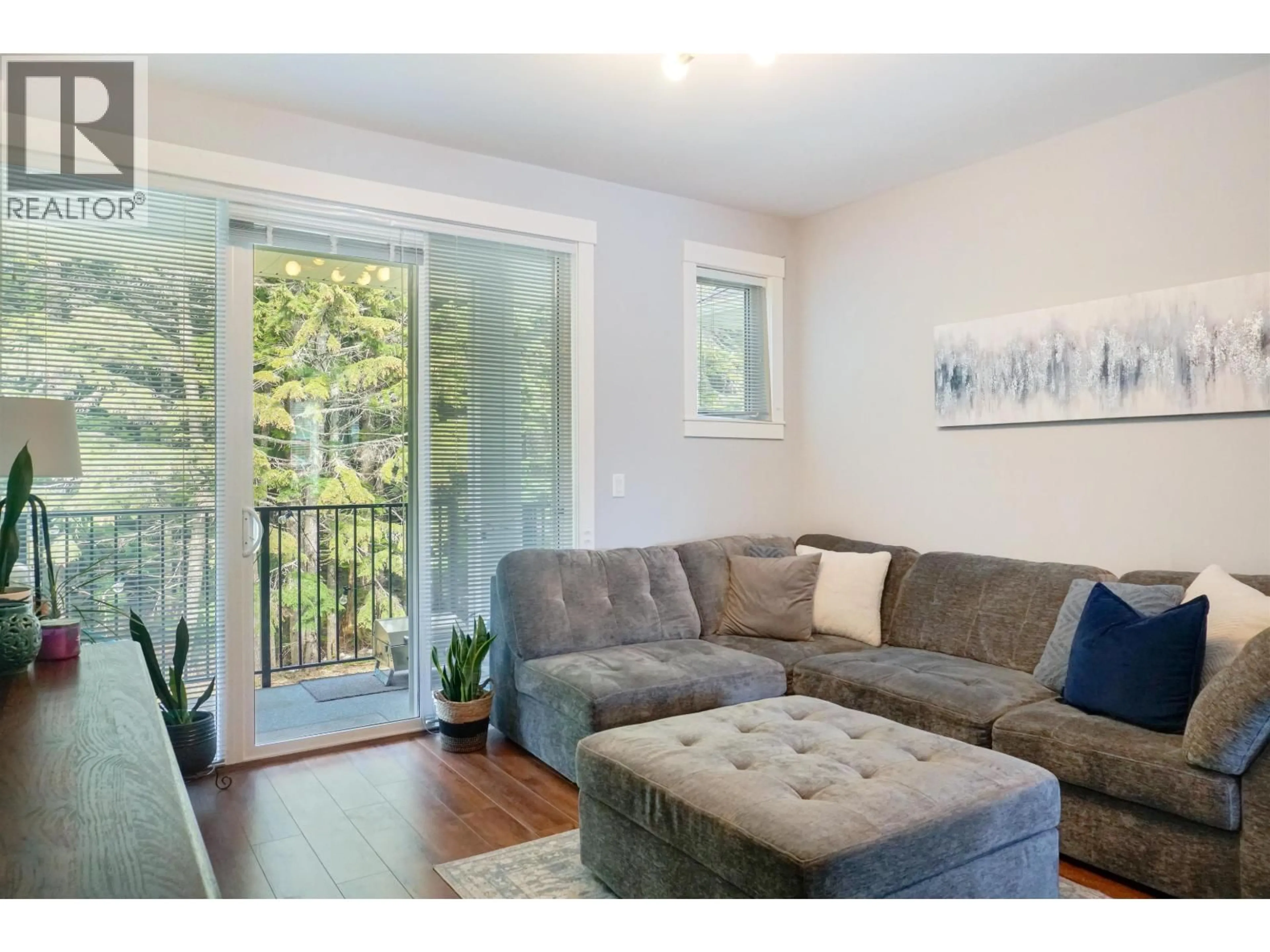 Living room with furniture, wood/laminate floor for 307 - 110 BAXTER AVENUE, Kitimat British Columbia V8C2N9