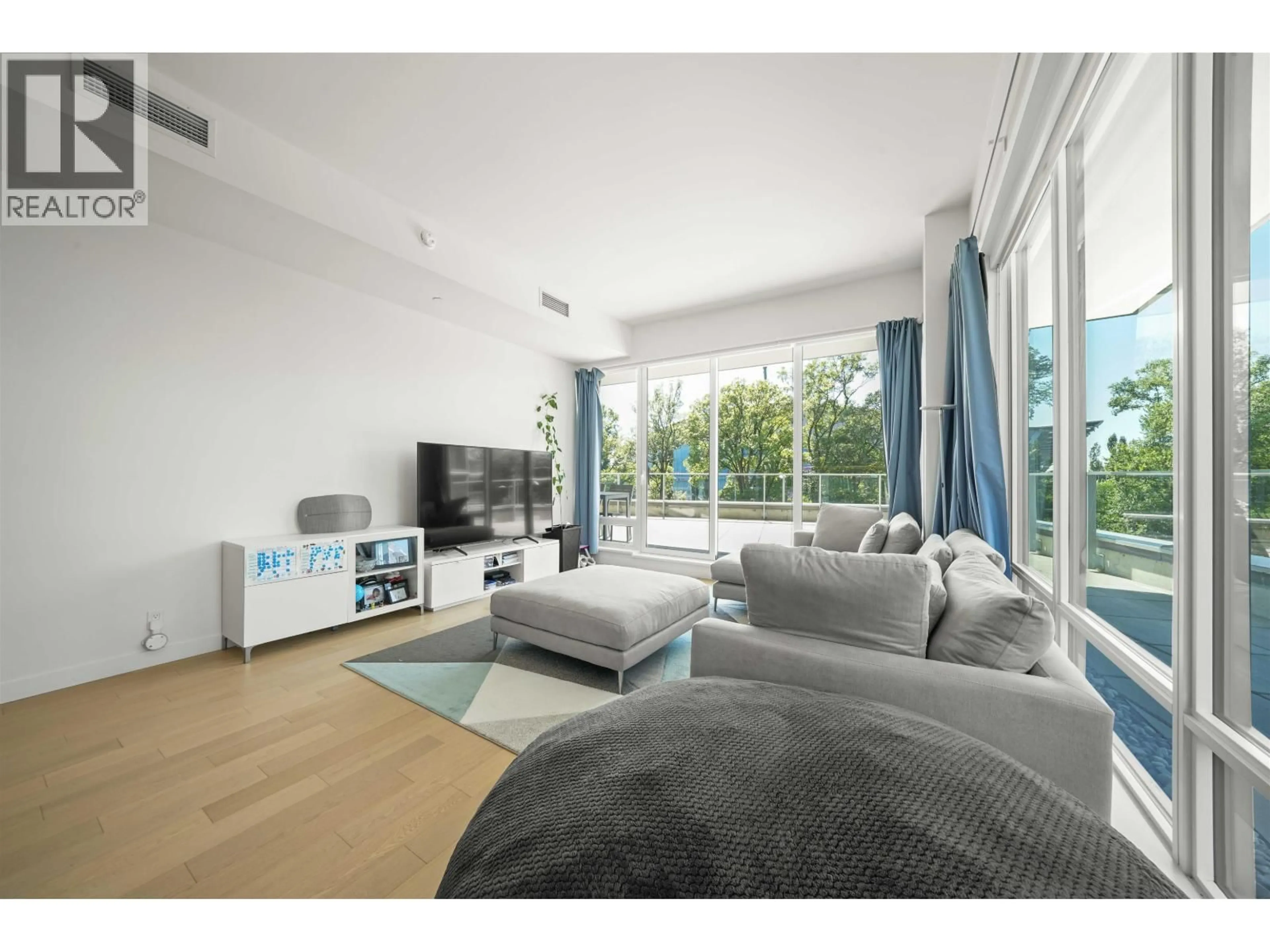 Living room with furniture, unknown for 207 - 6622 PEARSON WAY, Richmond British Columbia V7C0E4