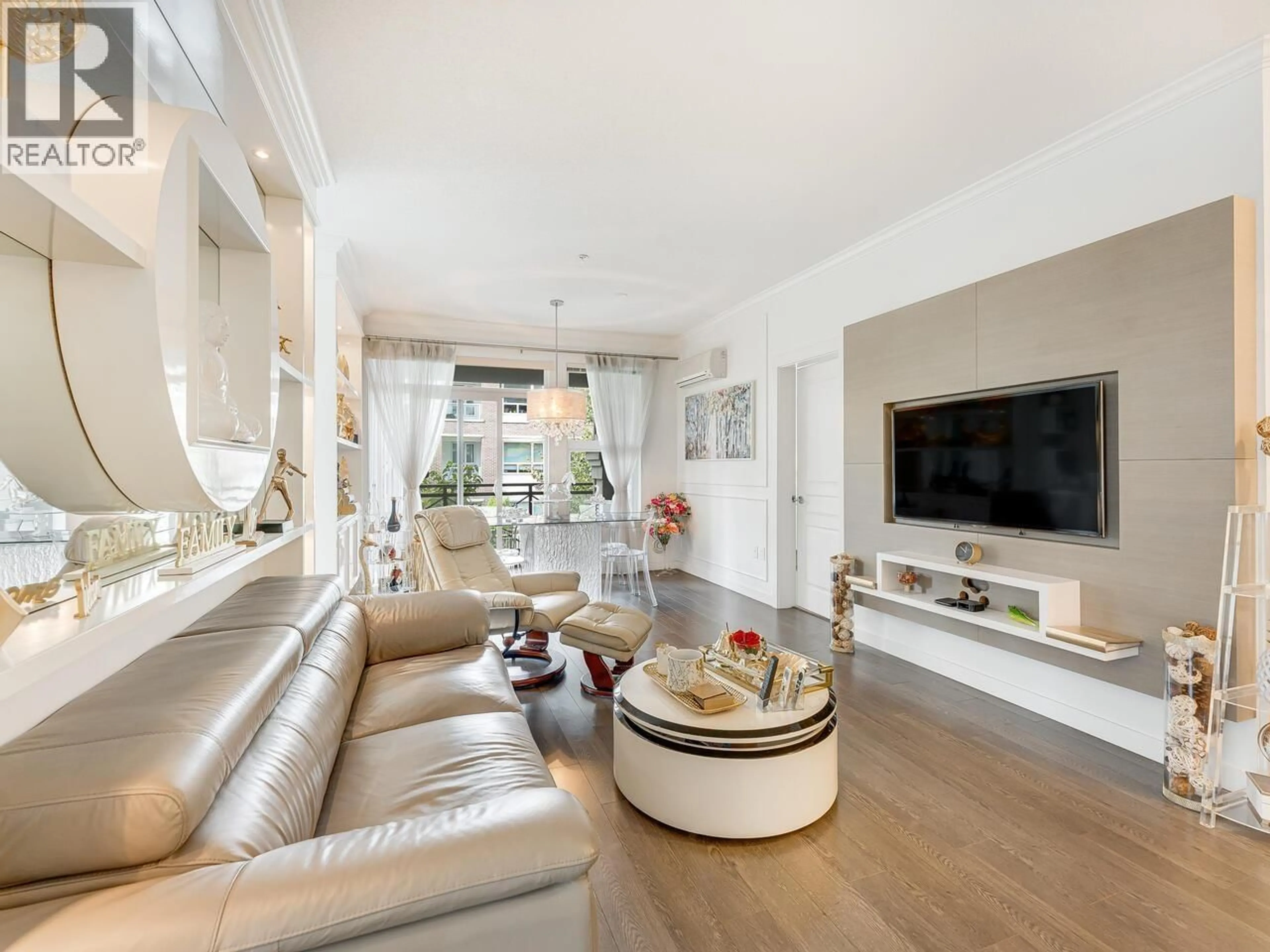 Living room with furniture, unknown for 213 - 9388 MCKIM WAY, Richmond British Columbia V6X0J7