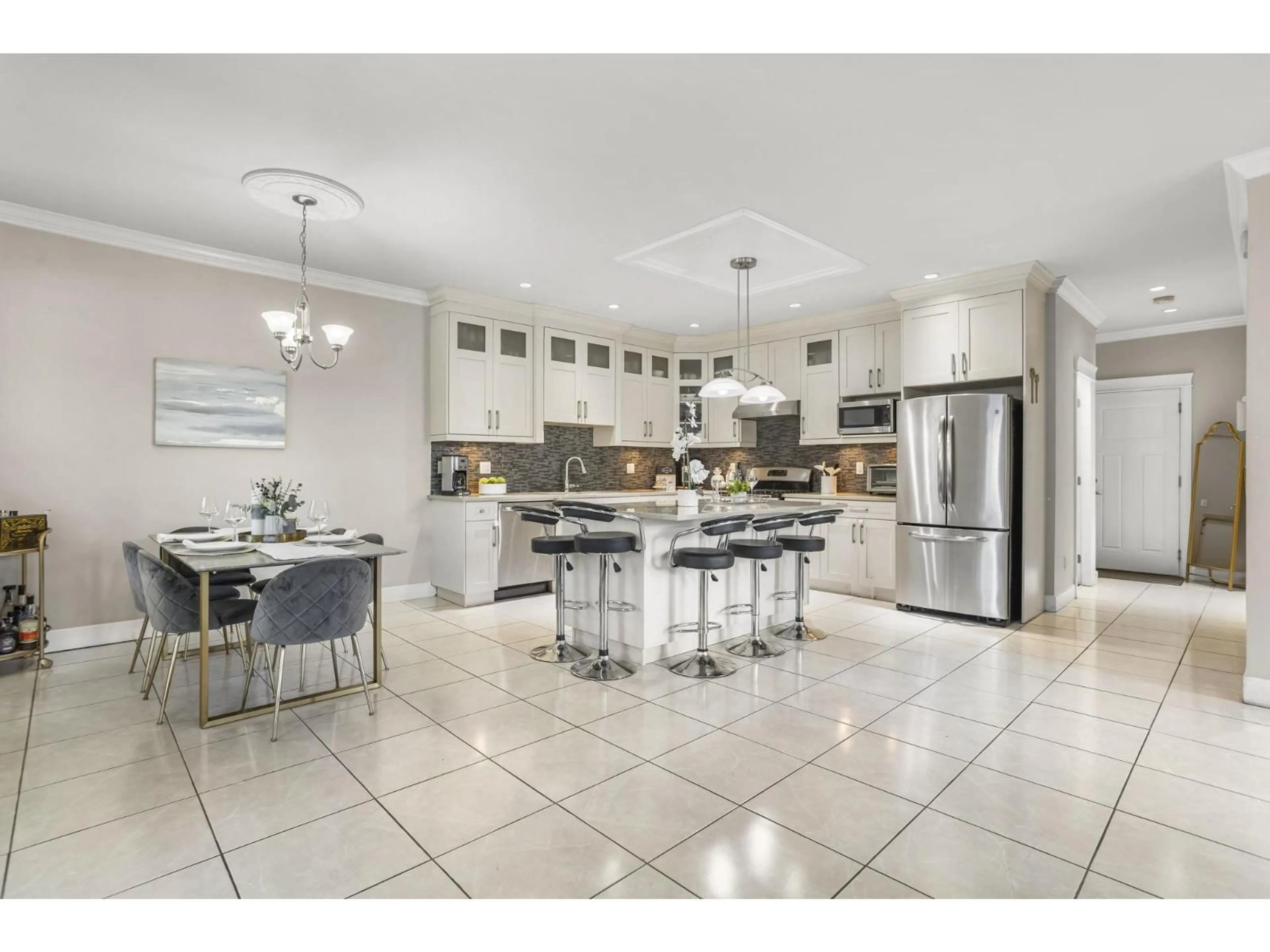 Open concept kitchen, ceramic/tile floor for 11790 80 AVENUE, Delta British Columbia V4C1X9