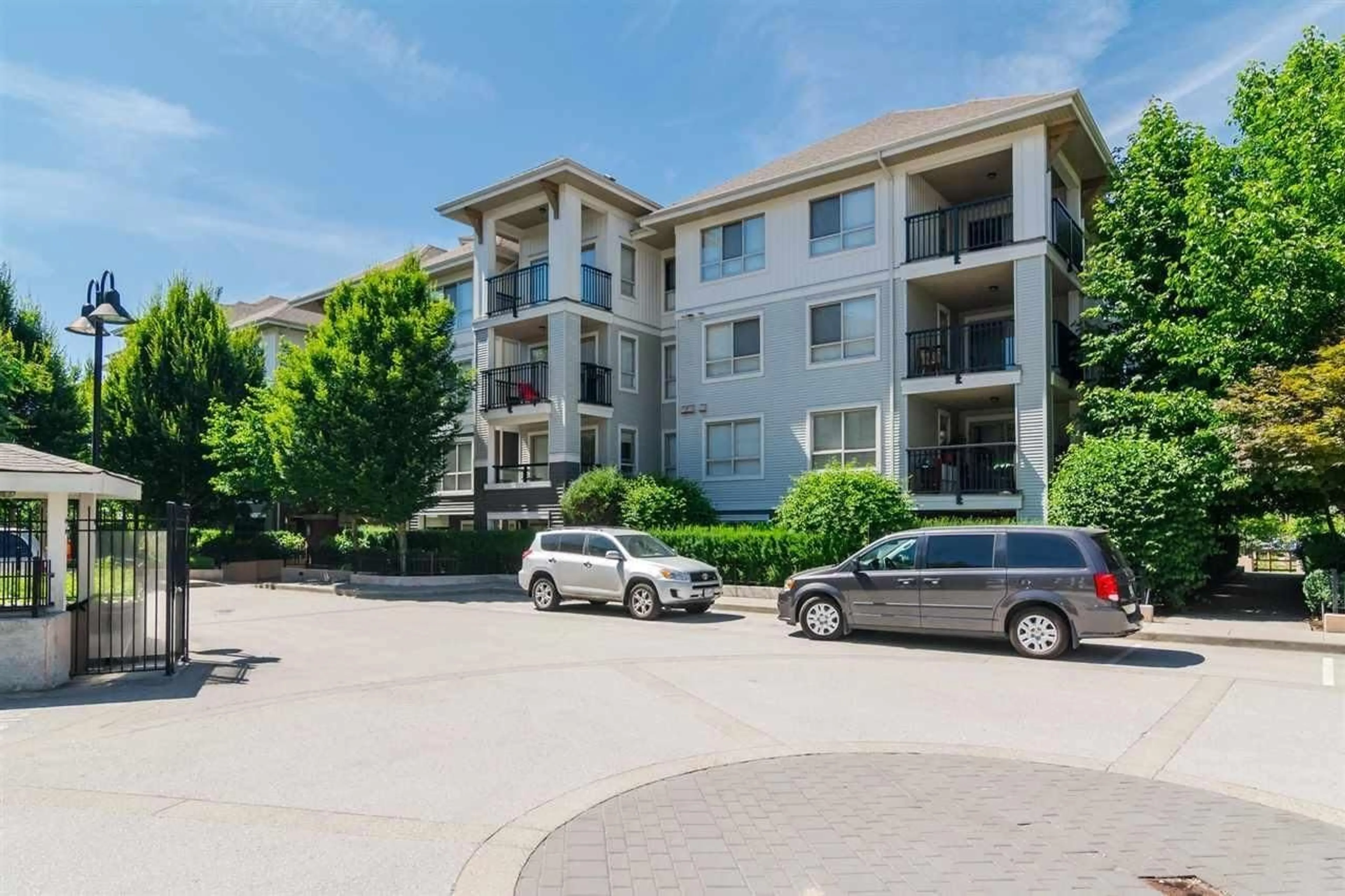 A pic from outside/outdoor area/front of a property/back of a property/a pic from drone, unknown for D303 - 8929 202 STREET, Langley British Columbia V1M0B4