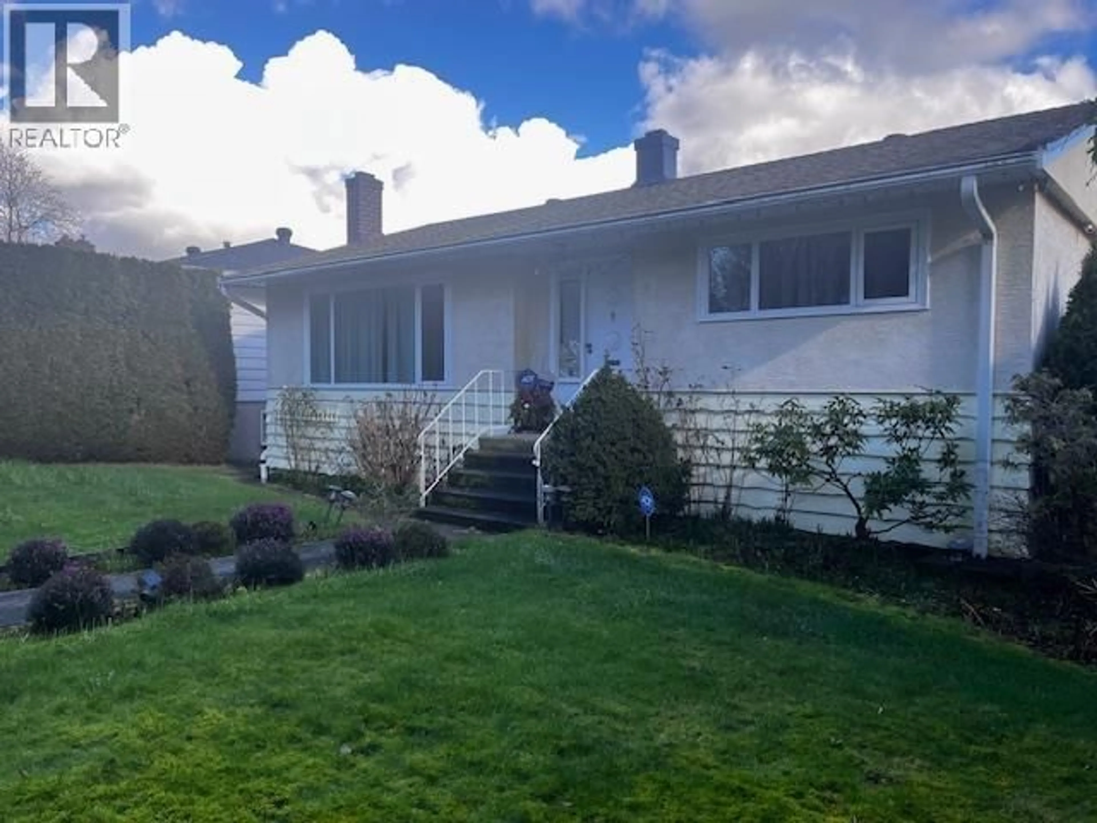Home with vinyl exterior material, street for 7430 BOUNDARY ROAD, Burnaby British Columbia V5S3S2
