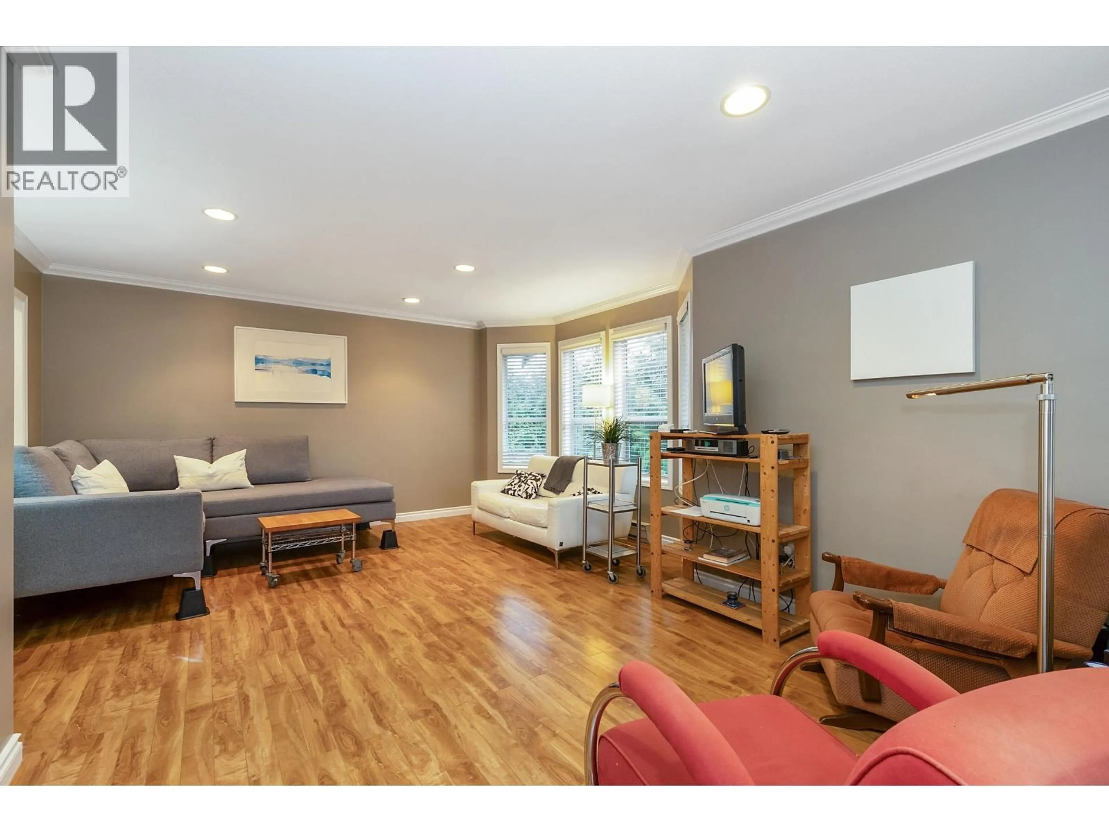 Living room with furniture, wood/laminate floor for 61 - 20554 118TH AVENUE, Maple Ridge British Columbia V2X0S3