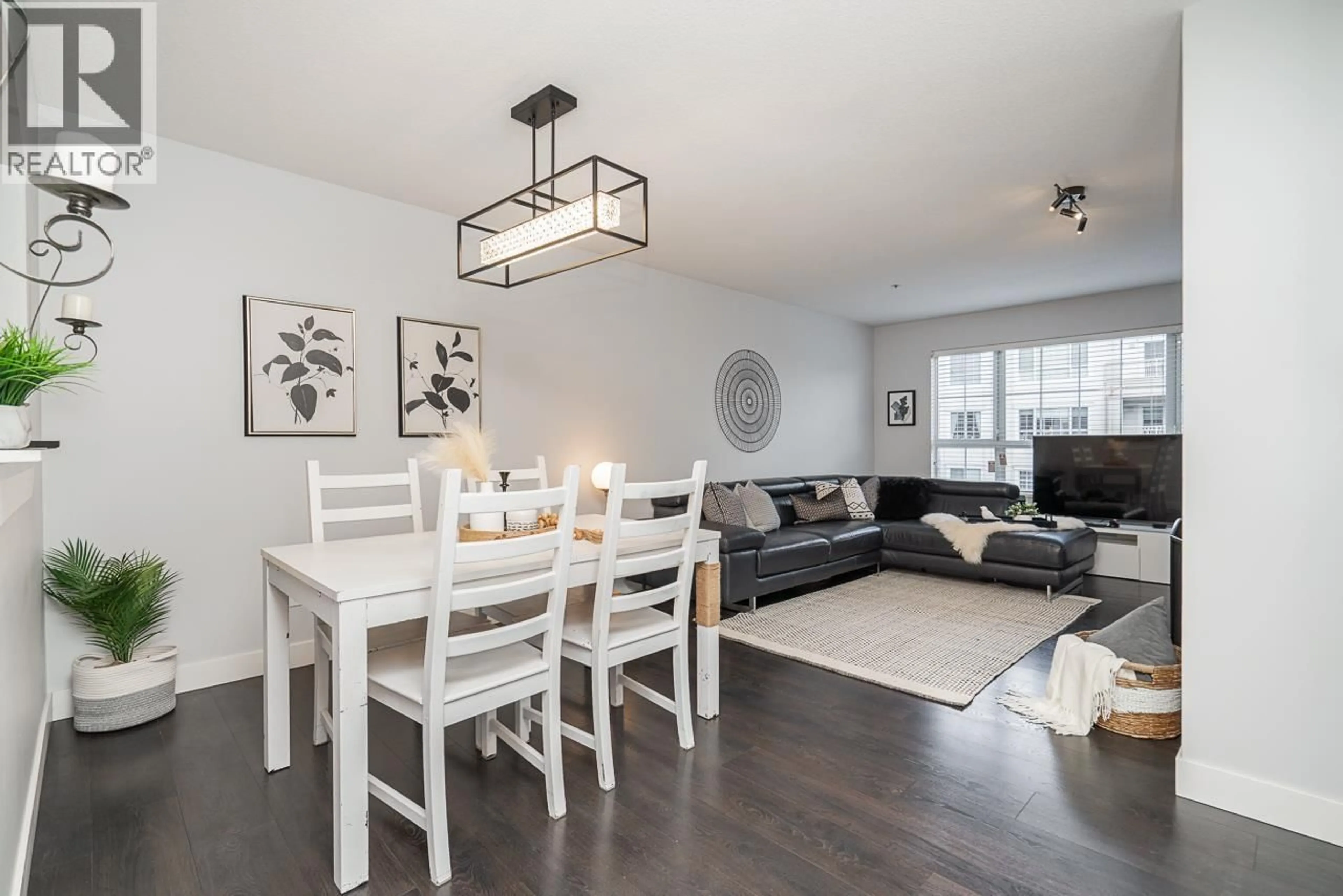 Living room with furniture, wood/laminate floor for 303 - 2960 PRINCESS CRESCENT, Coquitlam British Columbia V3B7P2