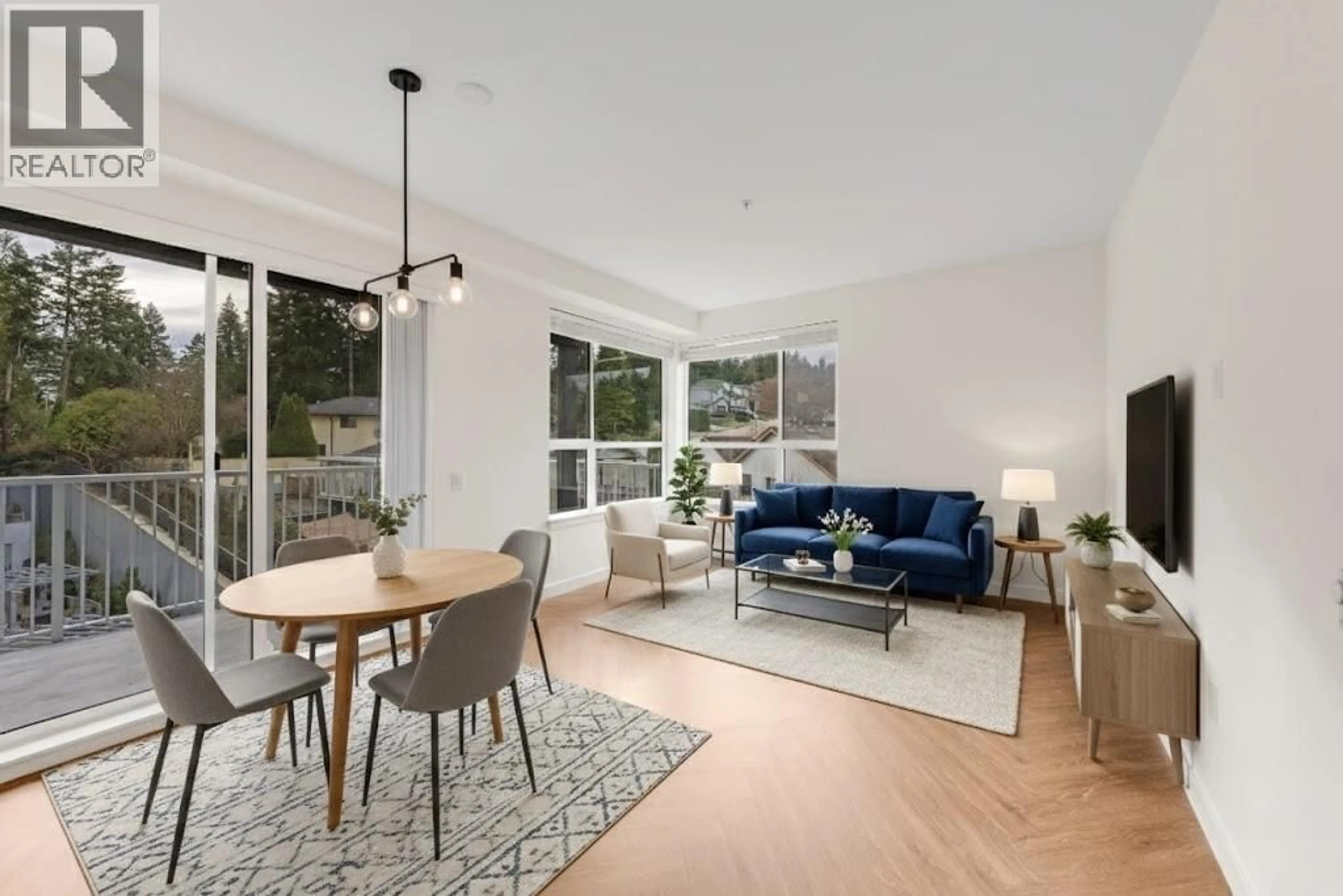 Living room with furniture, wood/laminate floor for 505 - 3229 ST JOHNS STREET, Port Moody British Columbia V3H0M4